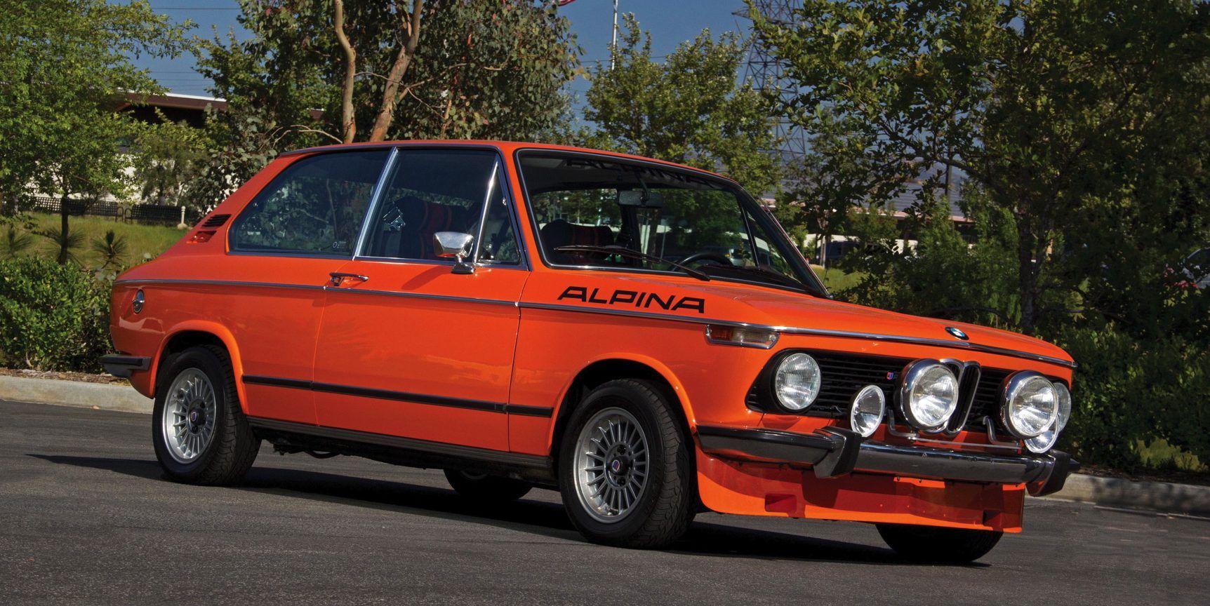 Orange 1974 BMW 2002tii Touring Alpina Parked