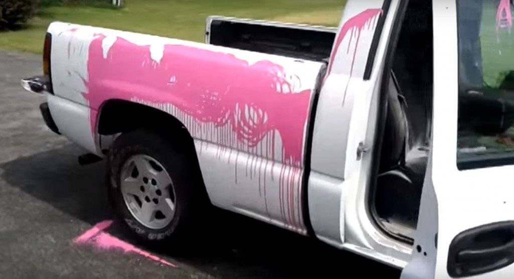 20 pictures of cars that were vandalized with paint