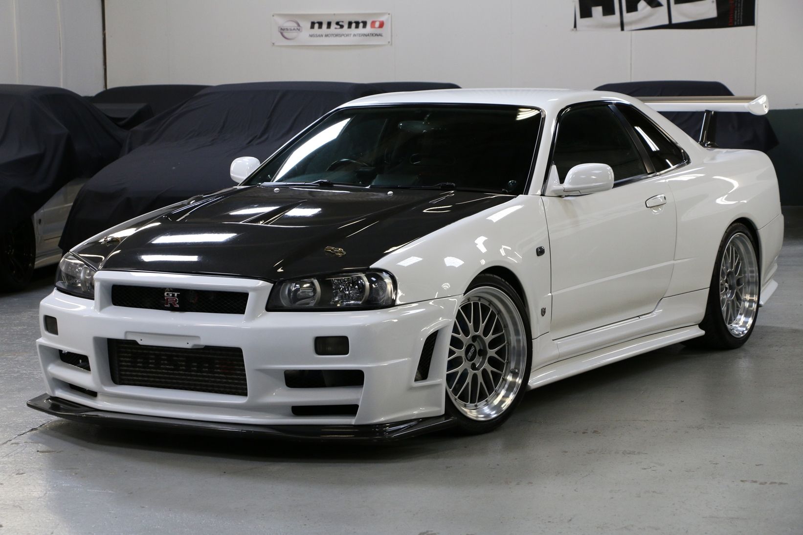 1999 White and Black Nissan GT-R R34