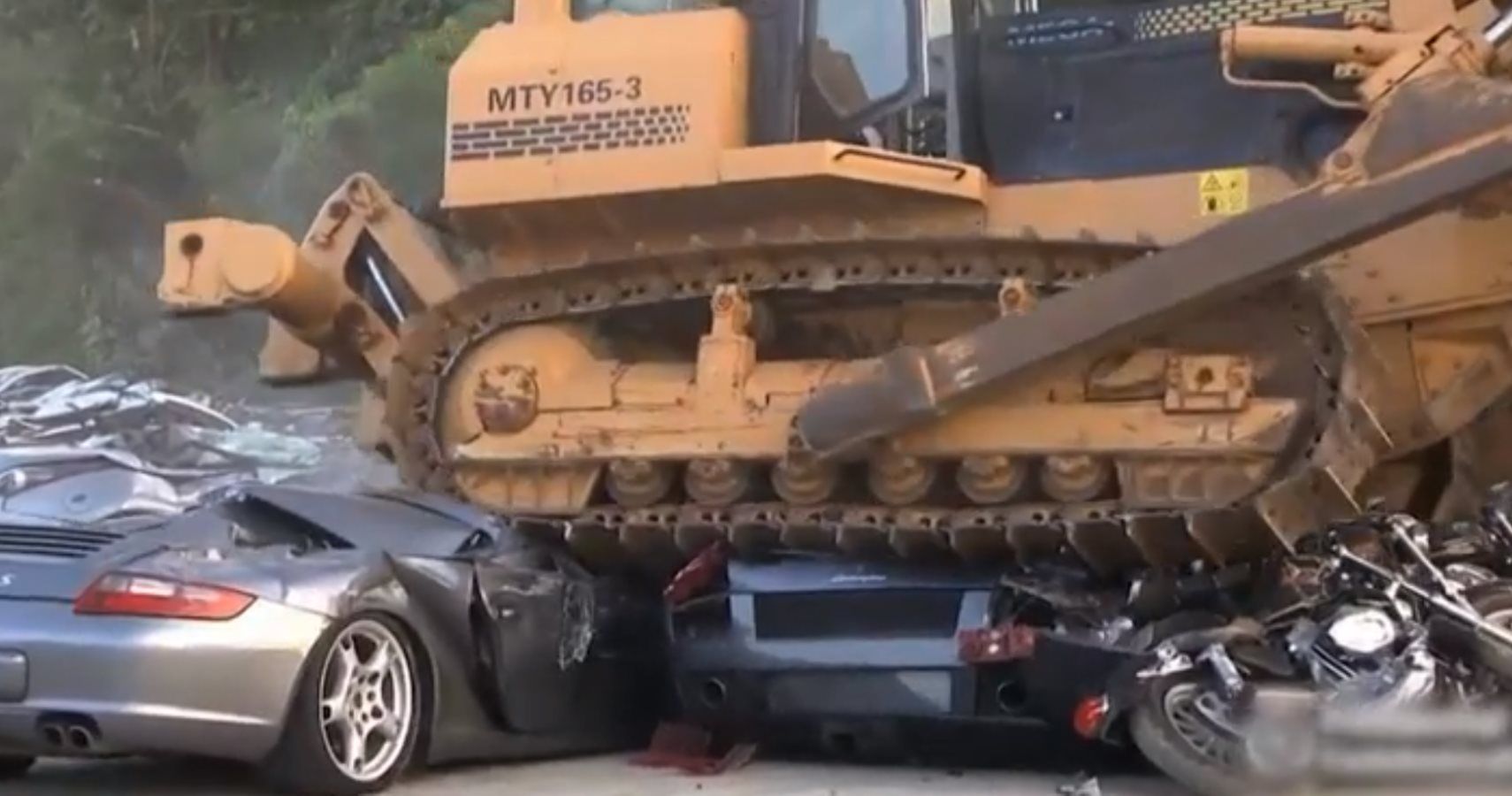 Philippines Task Force Destroys Hundreds Of Luxury Cars