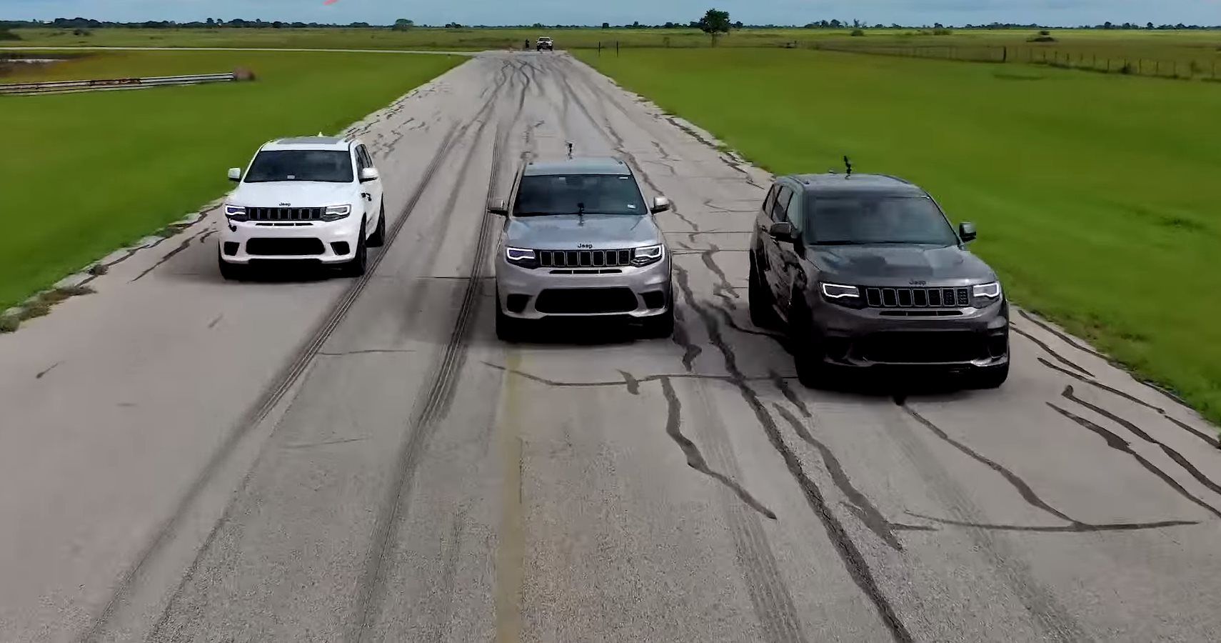 Watch Three Insanely Powerful Hennessey Jeep Trackhawks Race