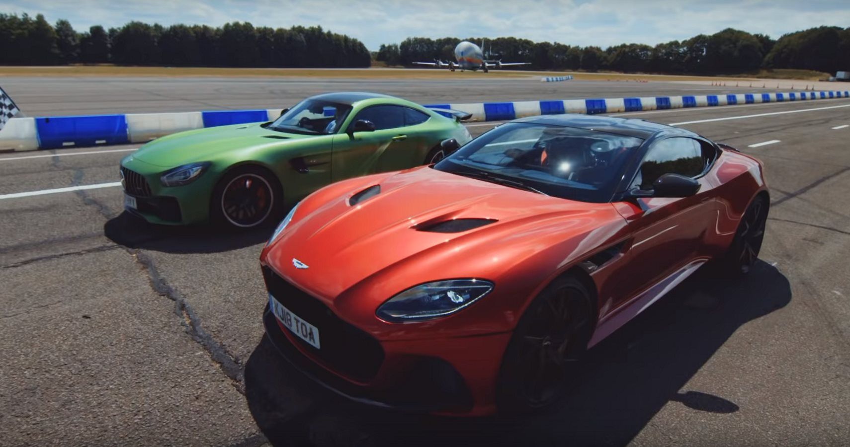 Watch An Aston Martin DBS Superleggera Take On A Mercedes-AMG GT R On The Drag Strip