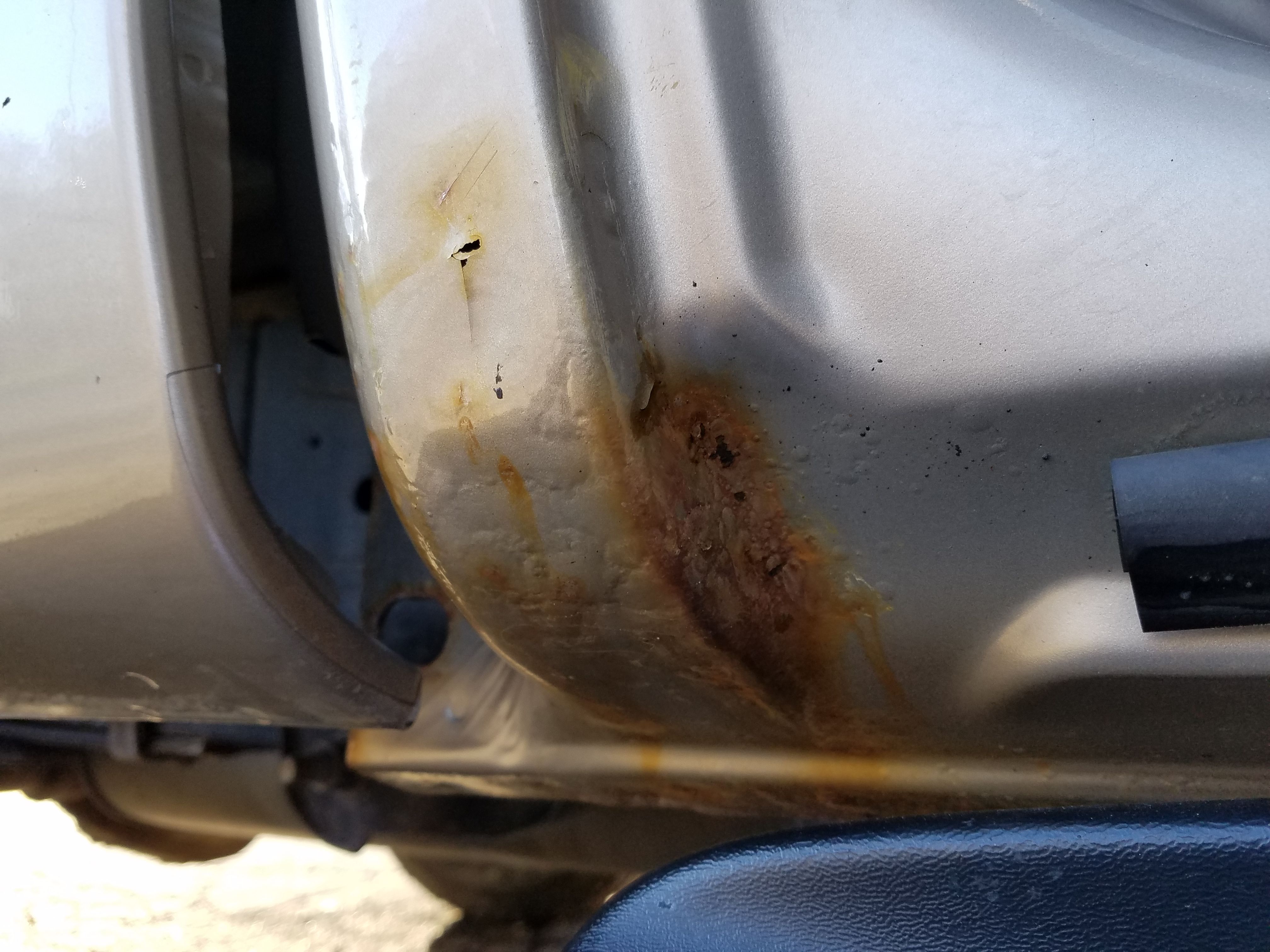 corrosion on a Ford pickup underbody