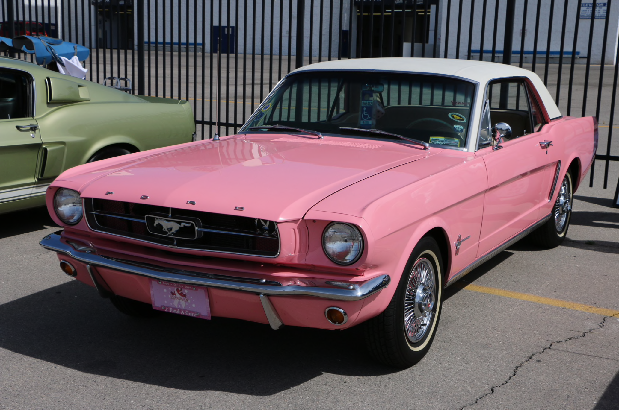 pink 1964 1/2 mustang, front view