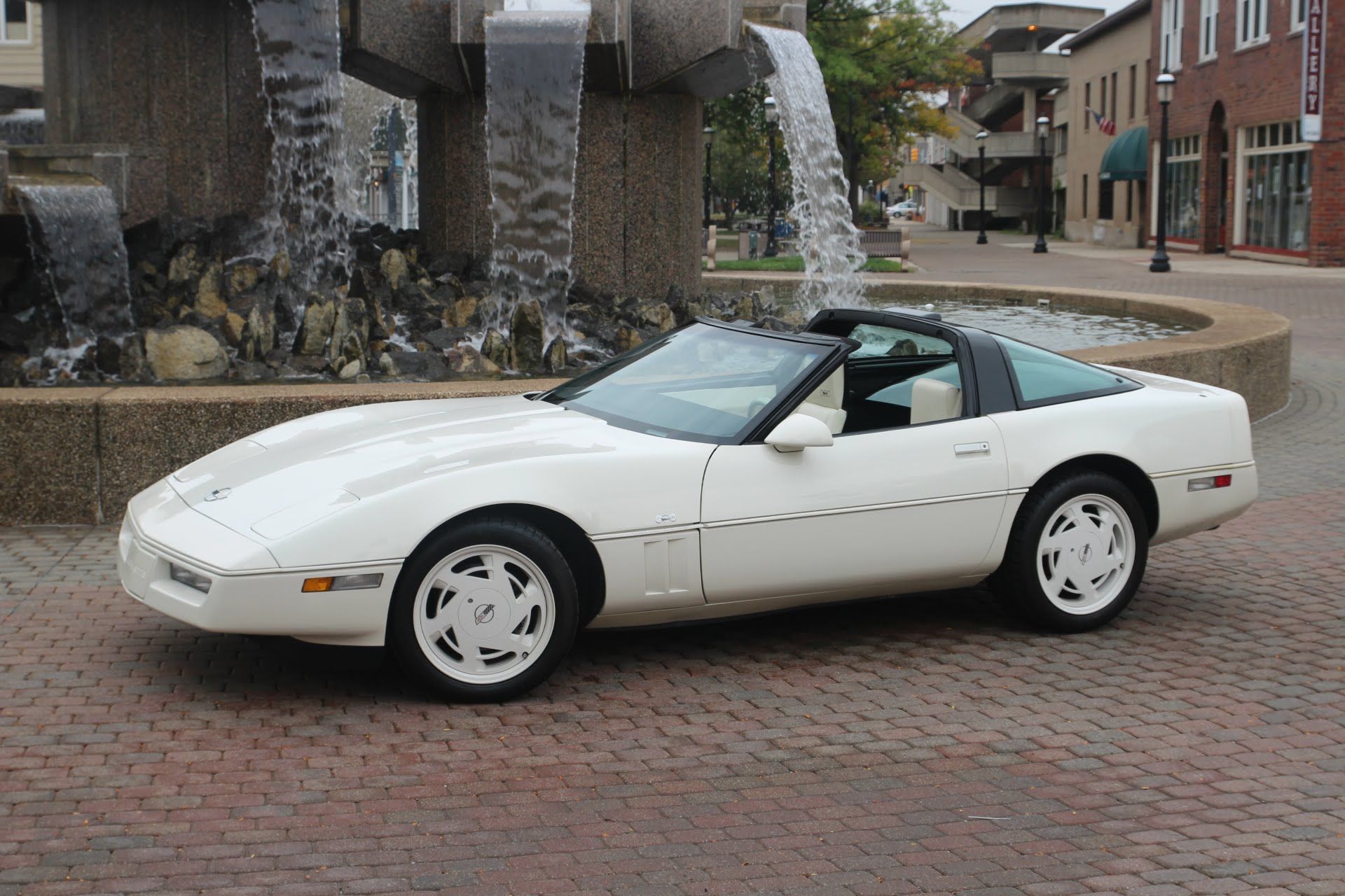 White 1988 Corvette Commemorative Edition Parked Outside