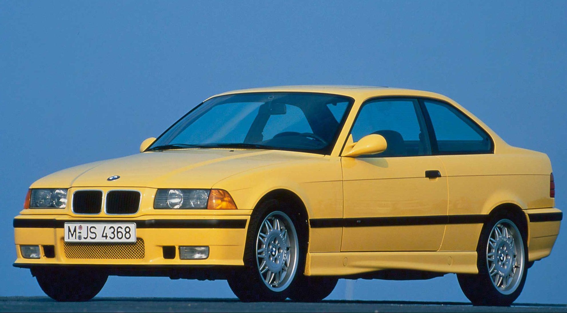 1995-1999-bmw-m3-e36 in yellow - front-quarter view