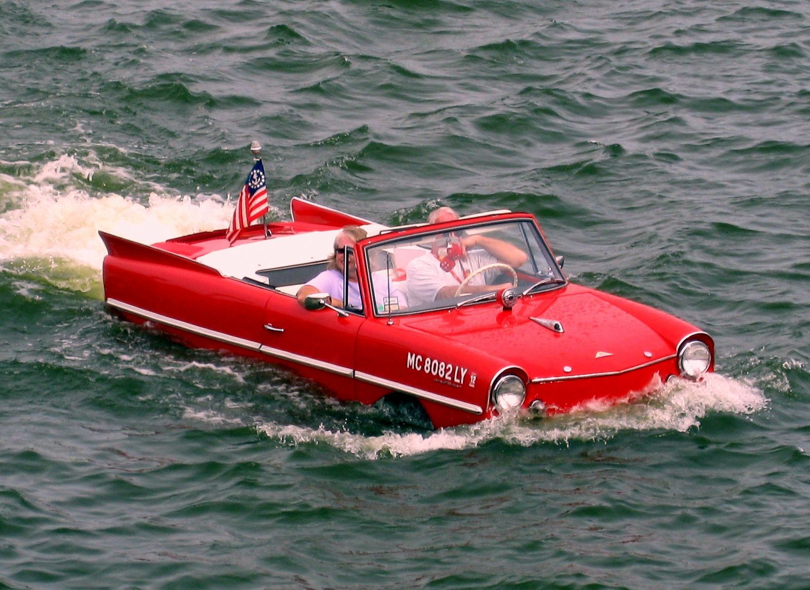 Red Amphicar In The Water