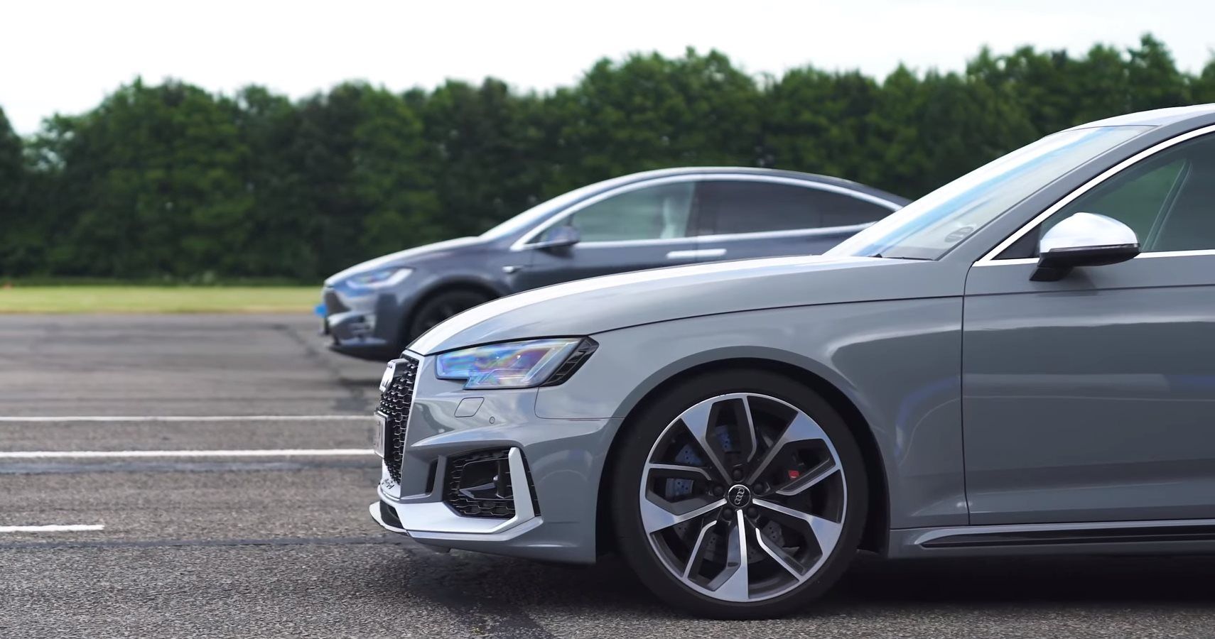 Audi RS4 Takes On Tesla Model X P100D In Drag And Rolling Races