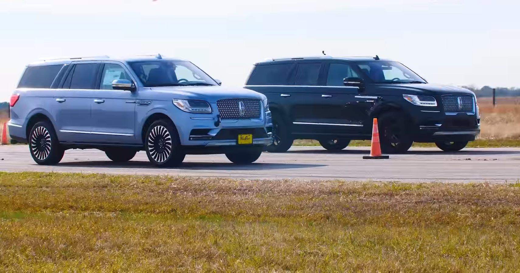 Watch Hennessey's HPE650 Lincoln Navigator Drag Race Stock Model And Show Off Its Power