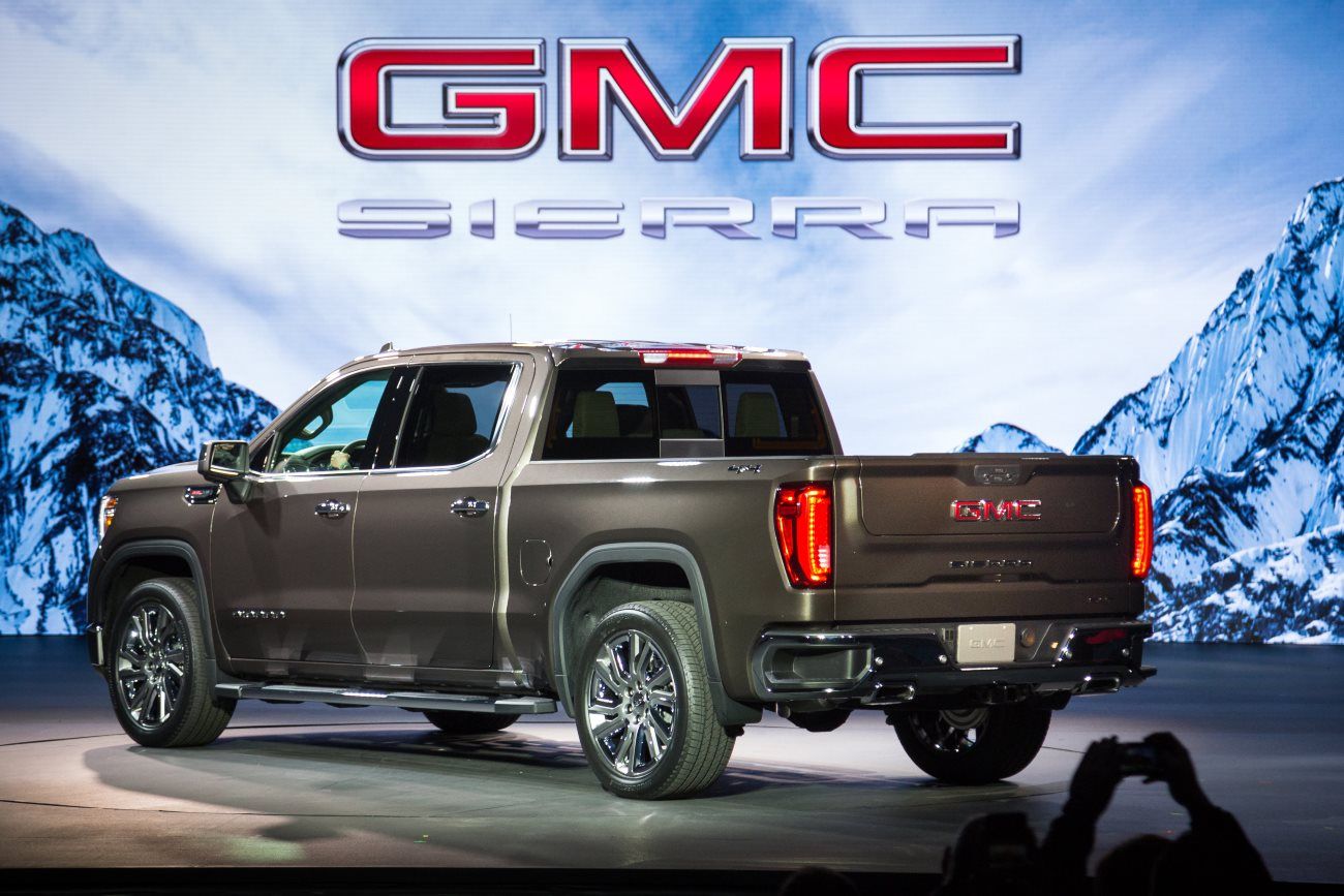 The 2019 GMC Sierra SLT makes its world debut Thursday, March 1, 2018 in Detroit, Michigan. The completely redesigned Sierra SLT features a larger upright grille, a taller hood and a more pronounced C-shaped lighting signature. The Sierra offers best-in-class cargo volume and the high-strength steel bed contains a revised alloy that offers 50 percent more strength than the current model. The 2019 GMC Sierra SLT will go on sale this fall. (Photo by Jeffrey Sauger for GMC)
