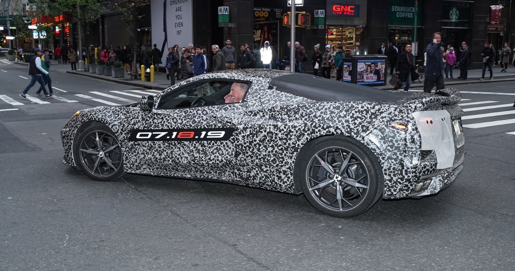 Chevrolet announces the next generation Corvette will debut 07.18.19. A camouflaged next generation Corvette travels down 7th Avenue near Times Square Thursday, April 11, 2019 in New York, New York. (Photo by Todd Plitt for Chevrolet)