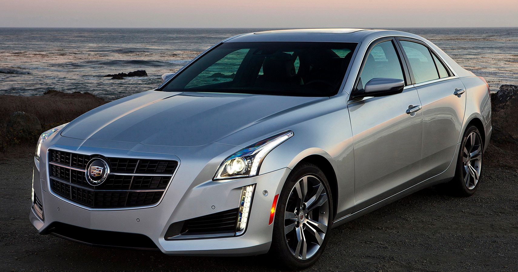 Silver 2019 Cadillac CTS by a water body