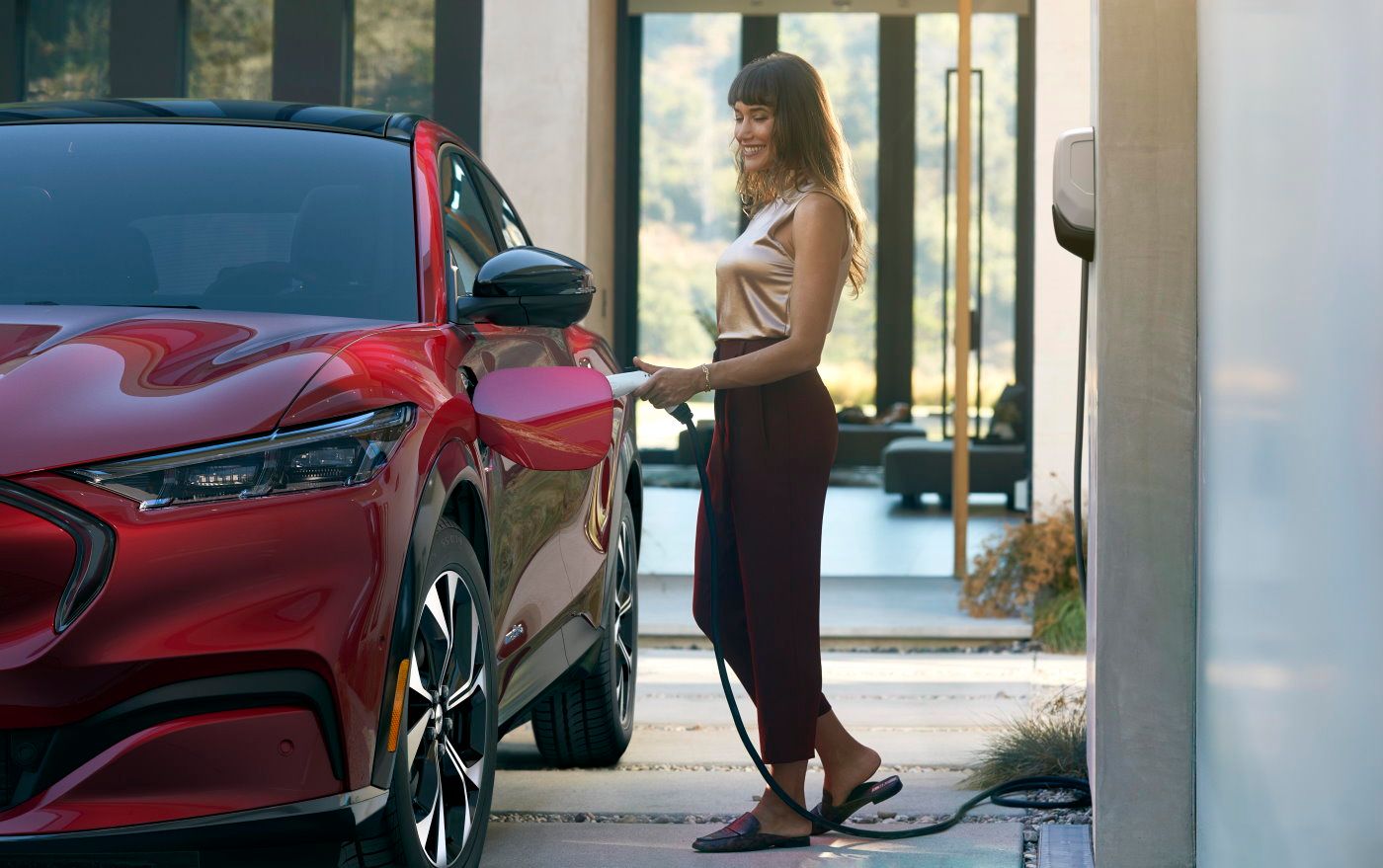 Electric vehicle owners do 80 percent of their charging at home, and Ford is offering a Ford Connected Charge Station that will be able to add an estimated average range of 32 miles per charging hour with a 240V outlet to the Mustang Mach-E RWD with extended range battery.