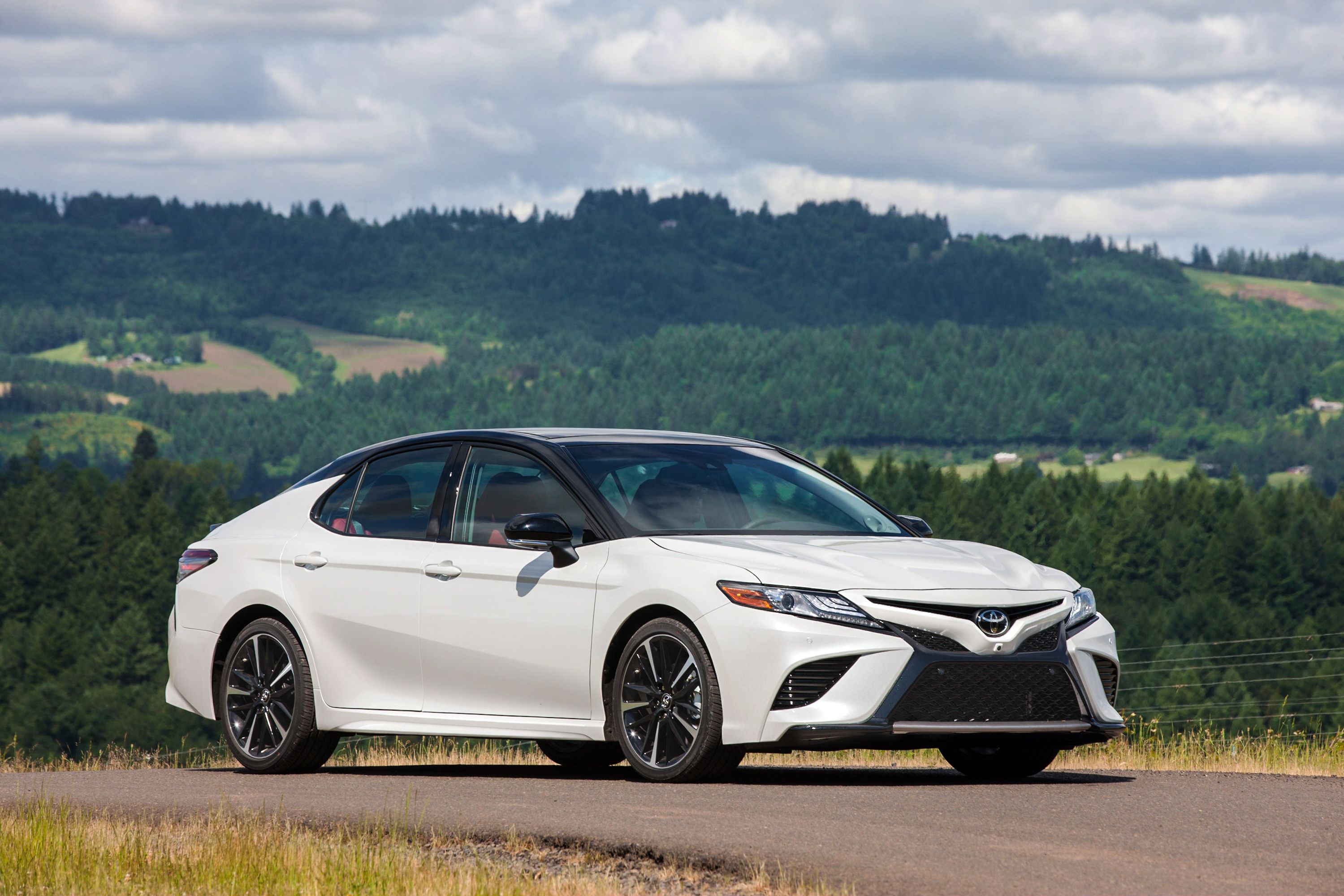 White 2018 Toyota Camry XSE on the road