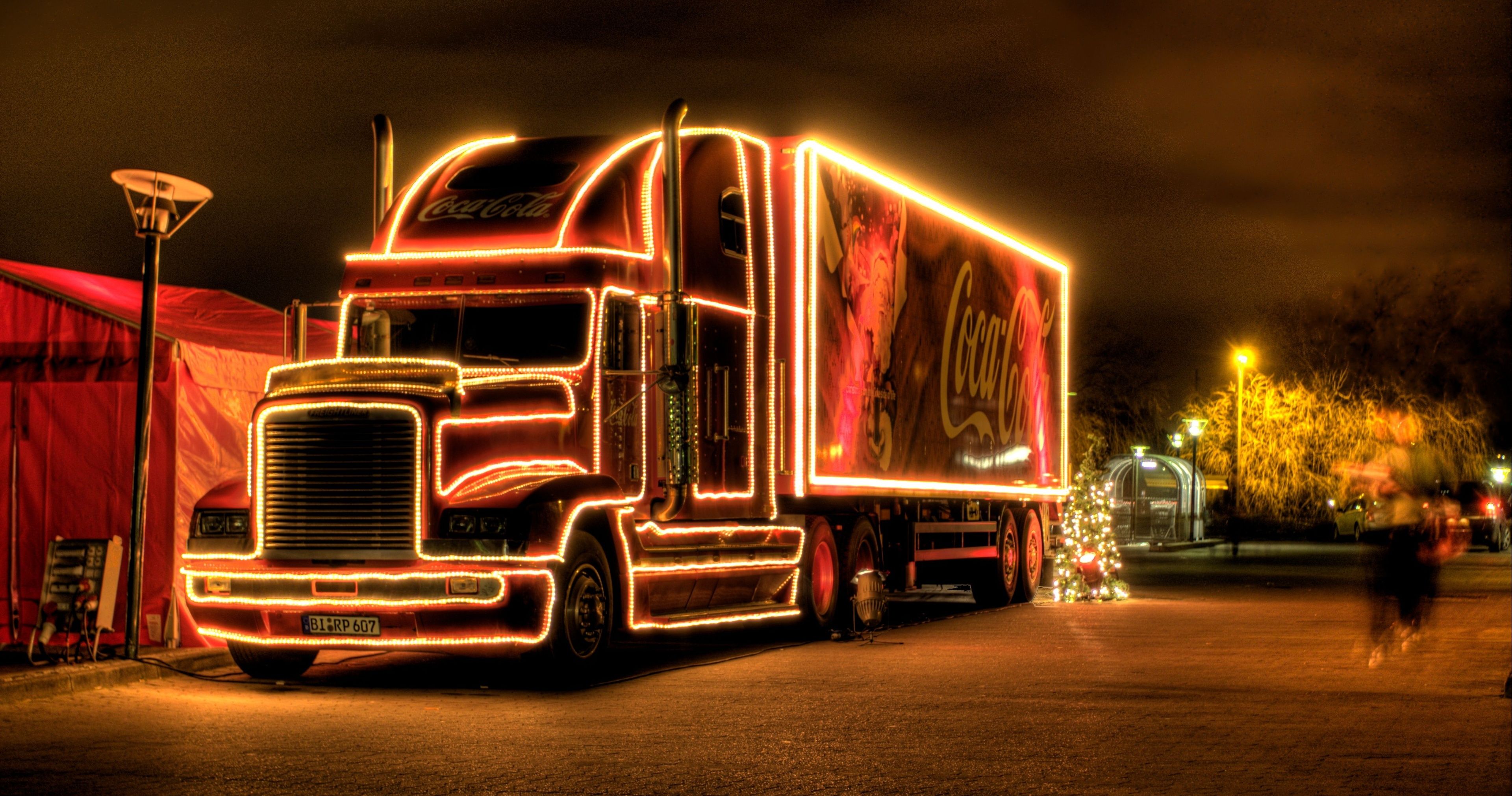 2 coca cola sold trucks