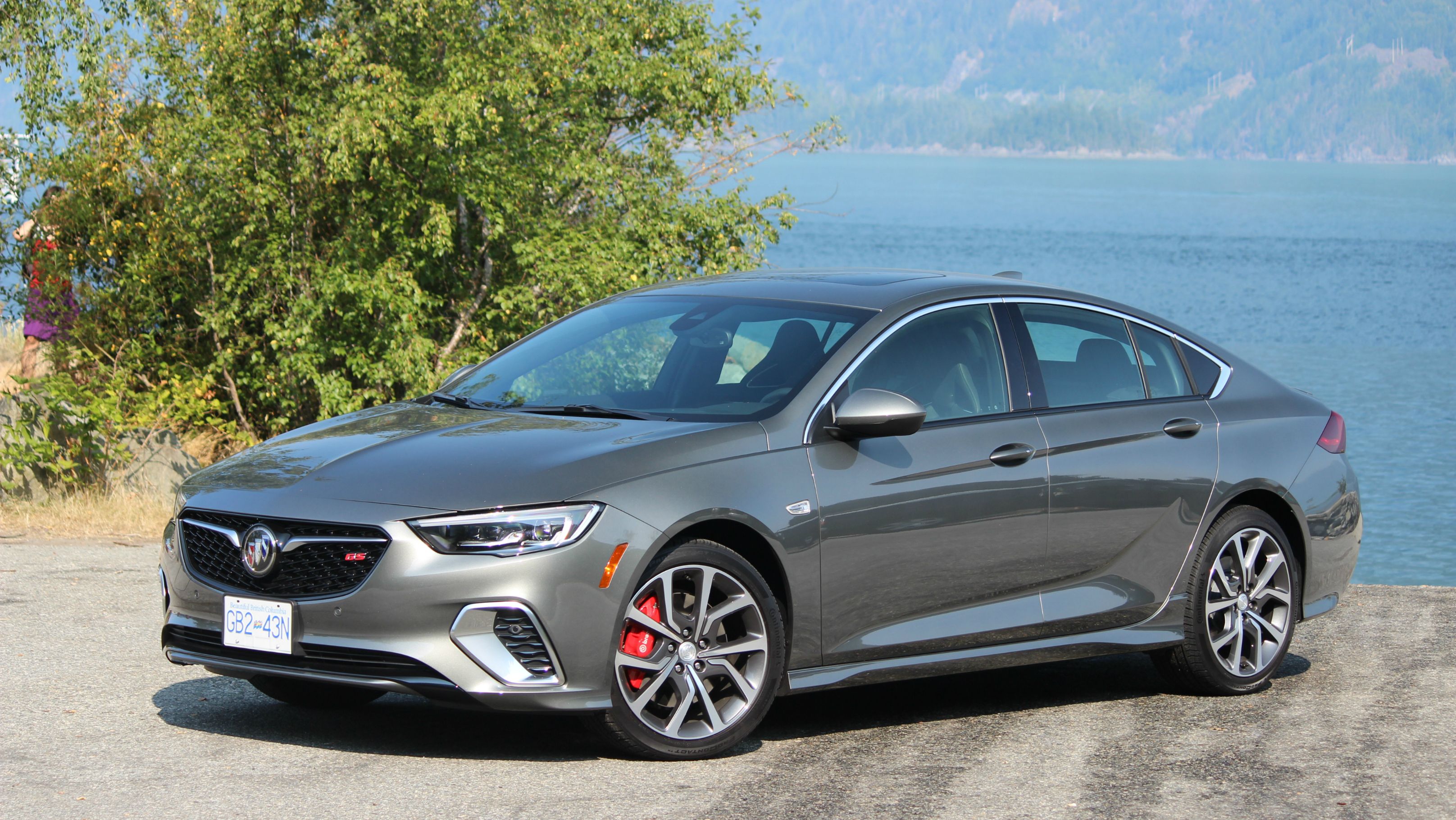 Silver 2018 Buick Regal GS parked in front of lake