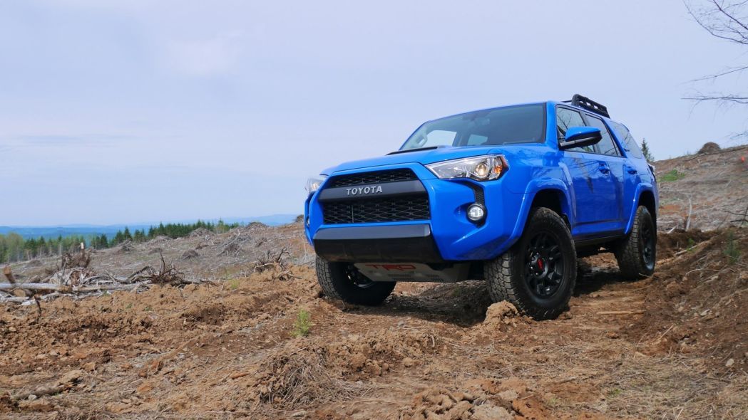 Bright blue 2017 Toyota 4Runners off-road outdoors