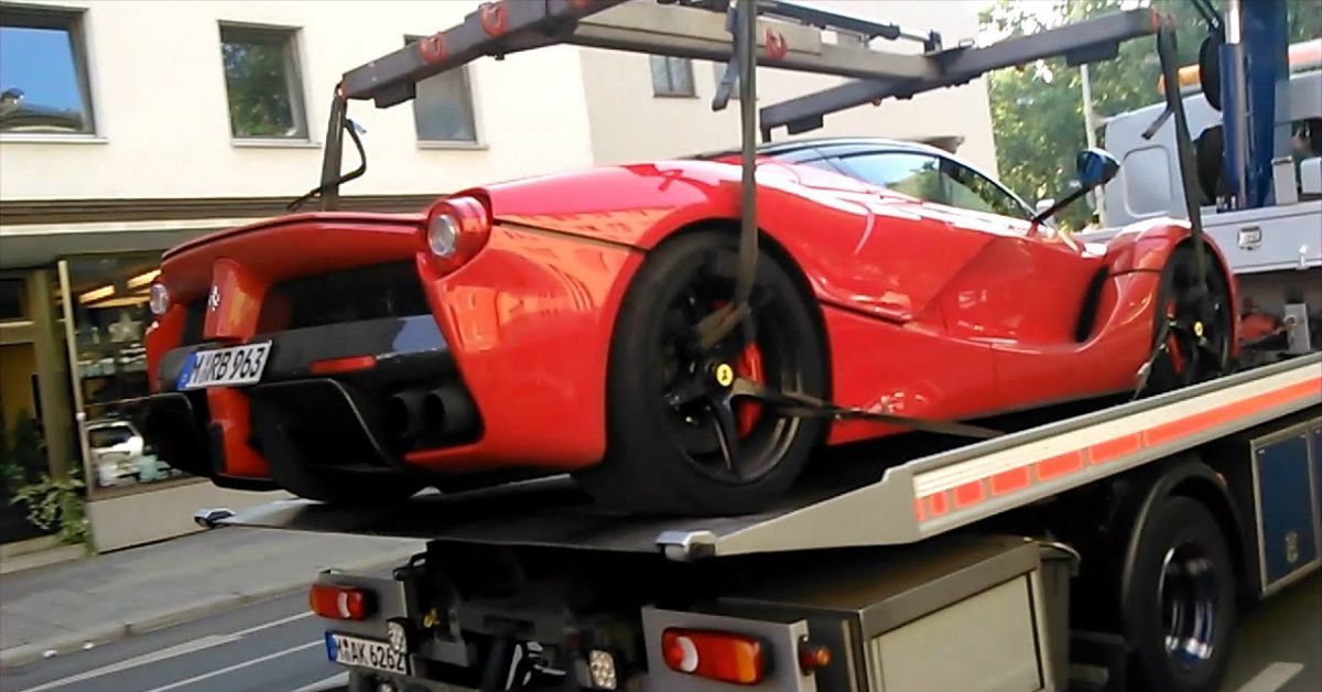 15 Sad Photos of Supercars Being Towed Away | HotCars