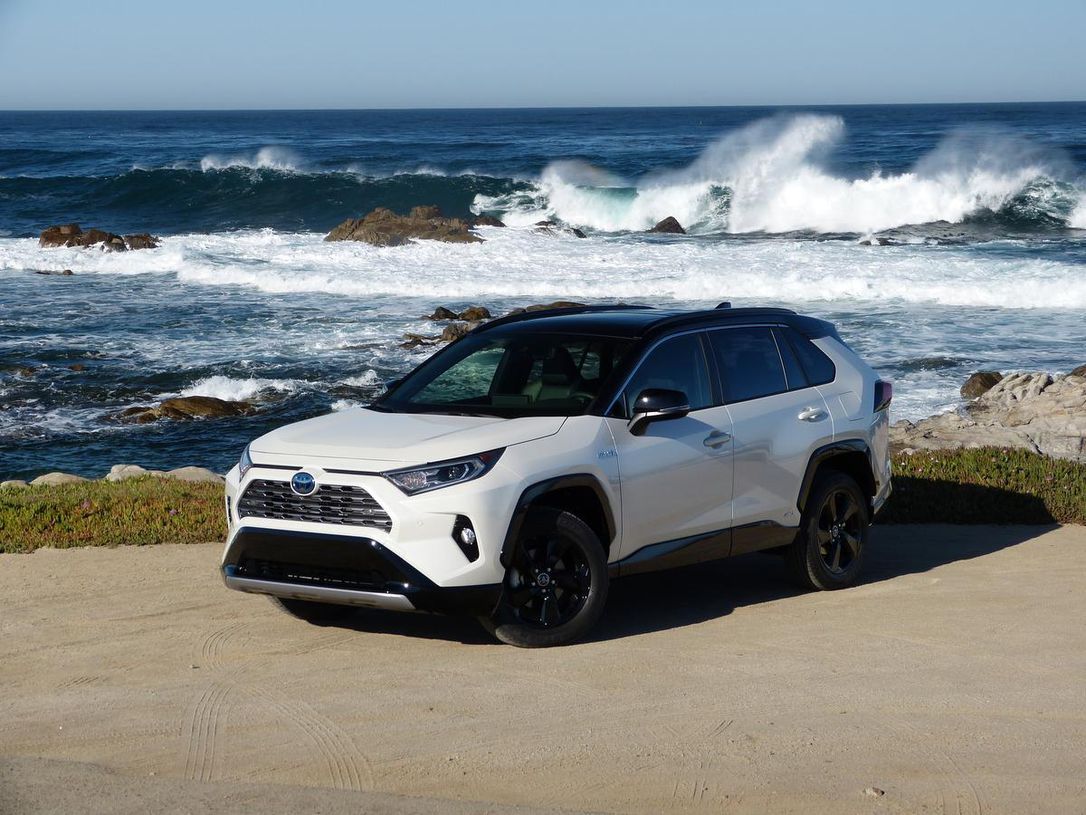 White 2019 Toyota RAV4 on the beach