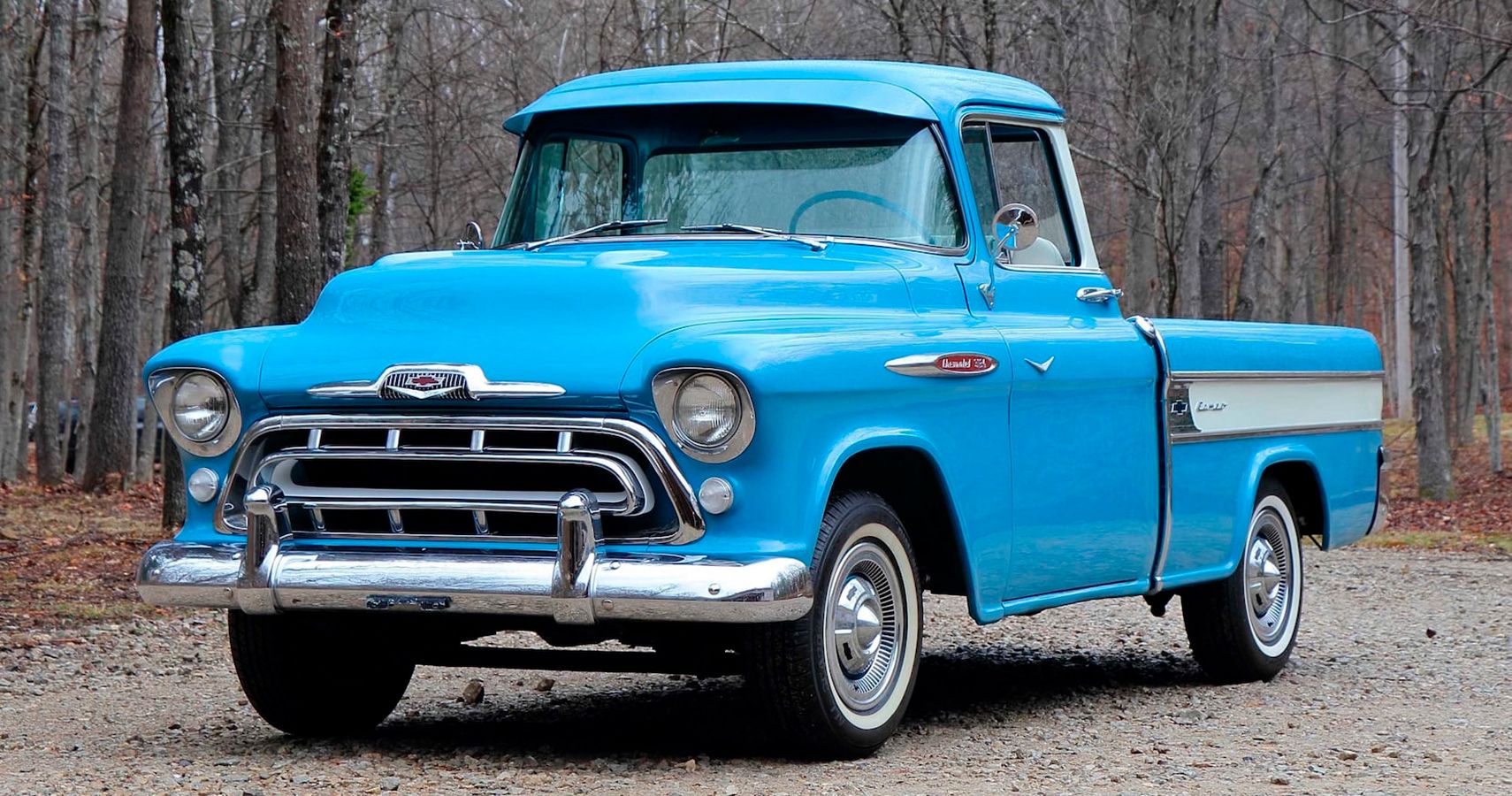 Blue 1957 Chevrolet Cameo Carrier on the road