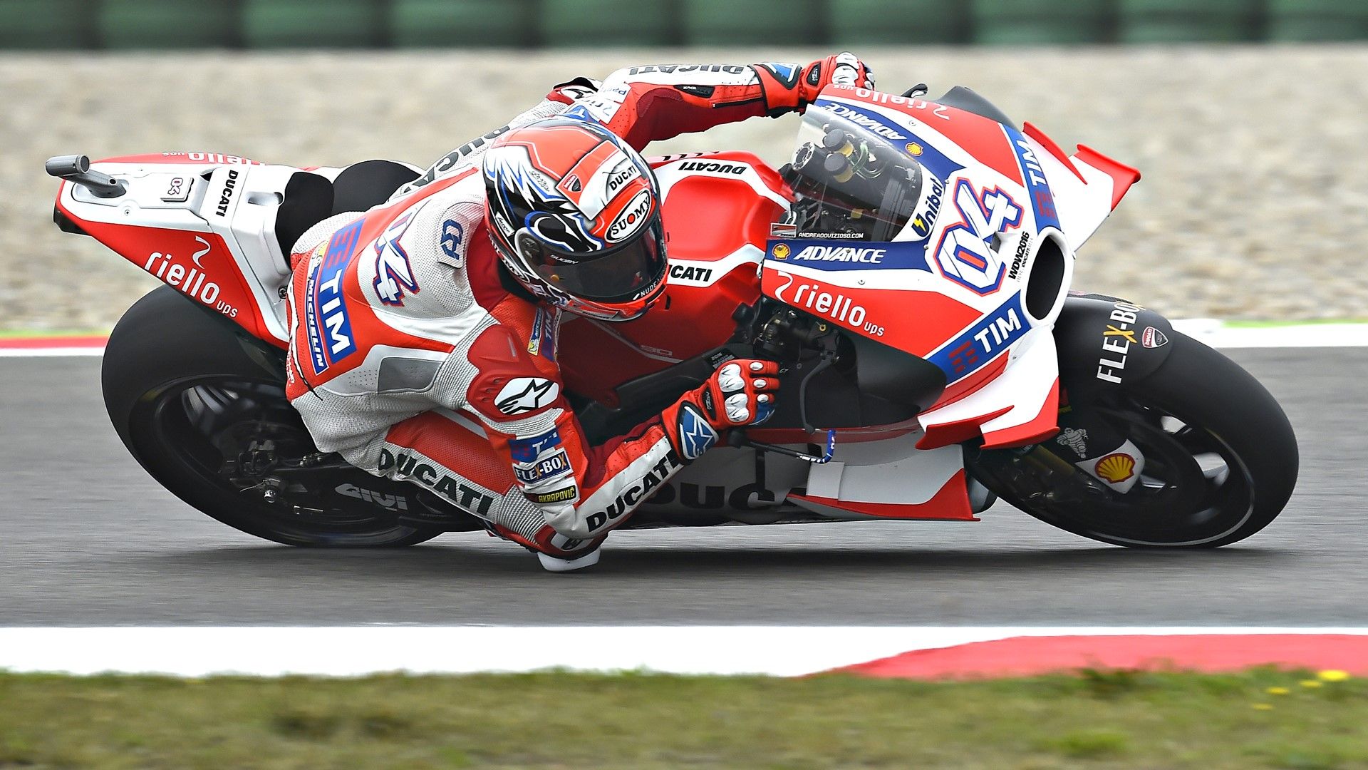 Racer entering a turn on a motorbike