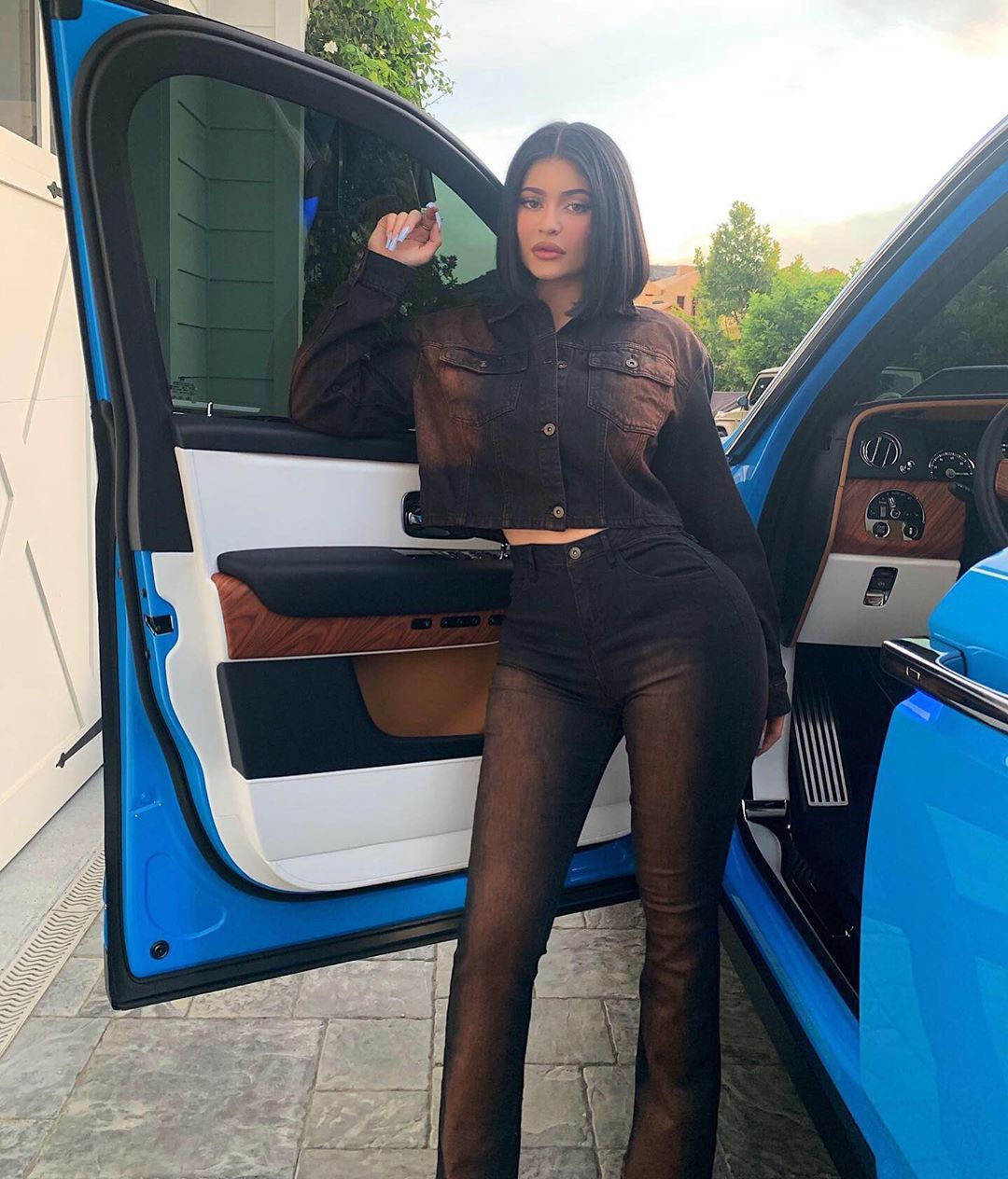 Kylie Jenner Posing with Car