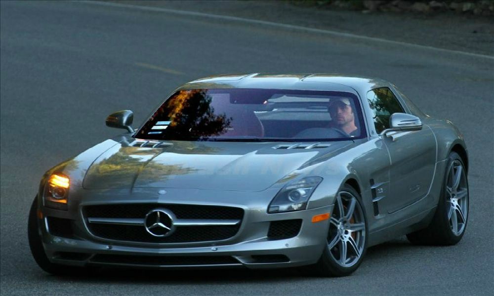 Patrick Dempsey driving his Mercedes-Benz SLS AMG