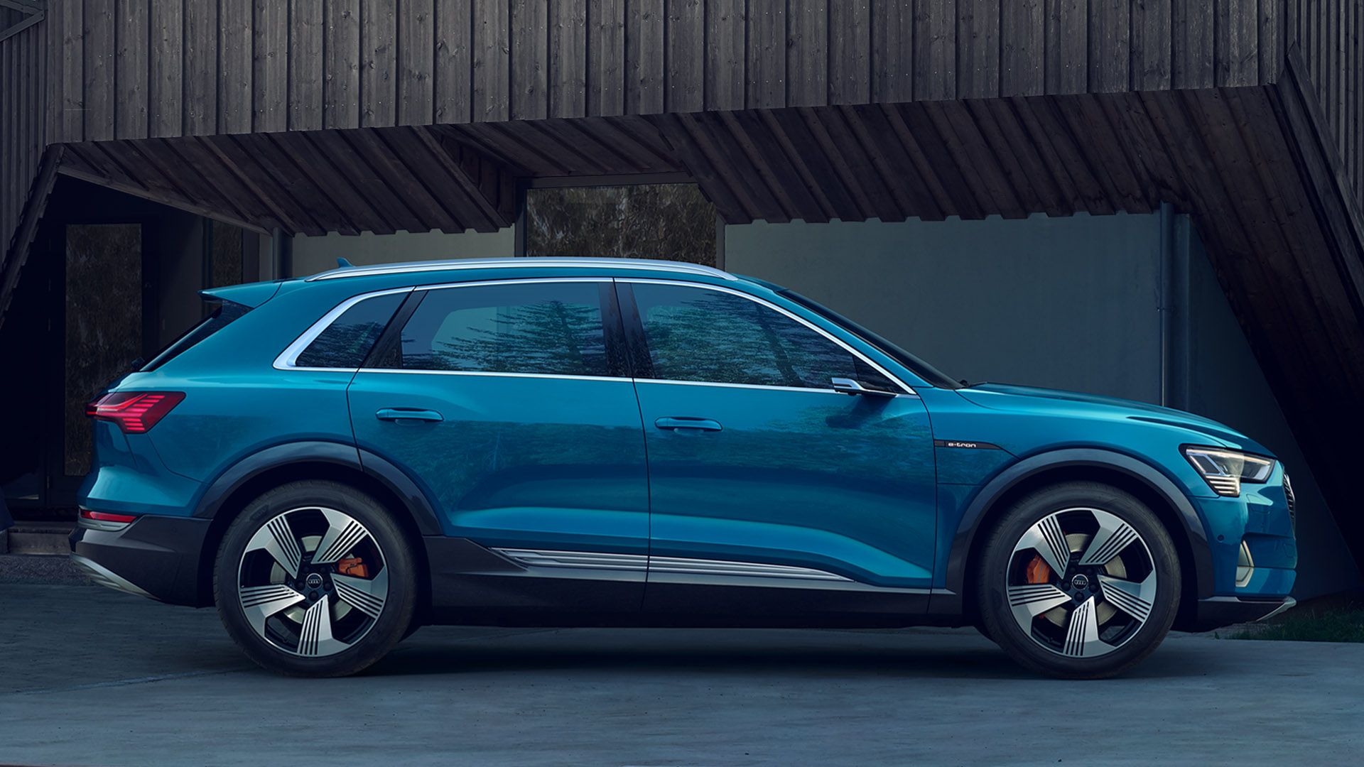 2020 blue Audi E-Tron side profile