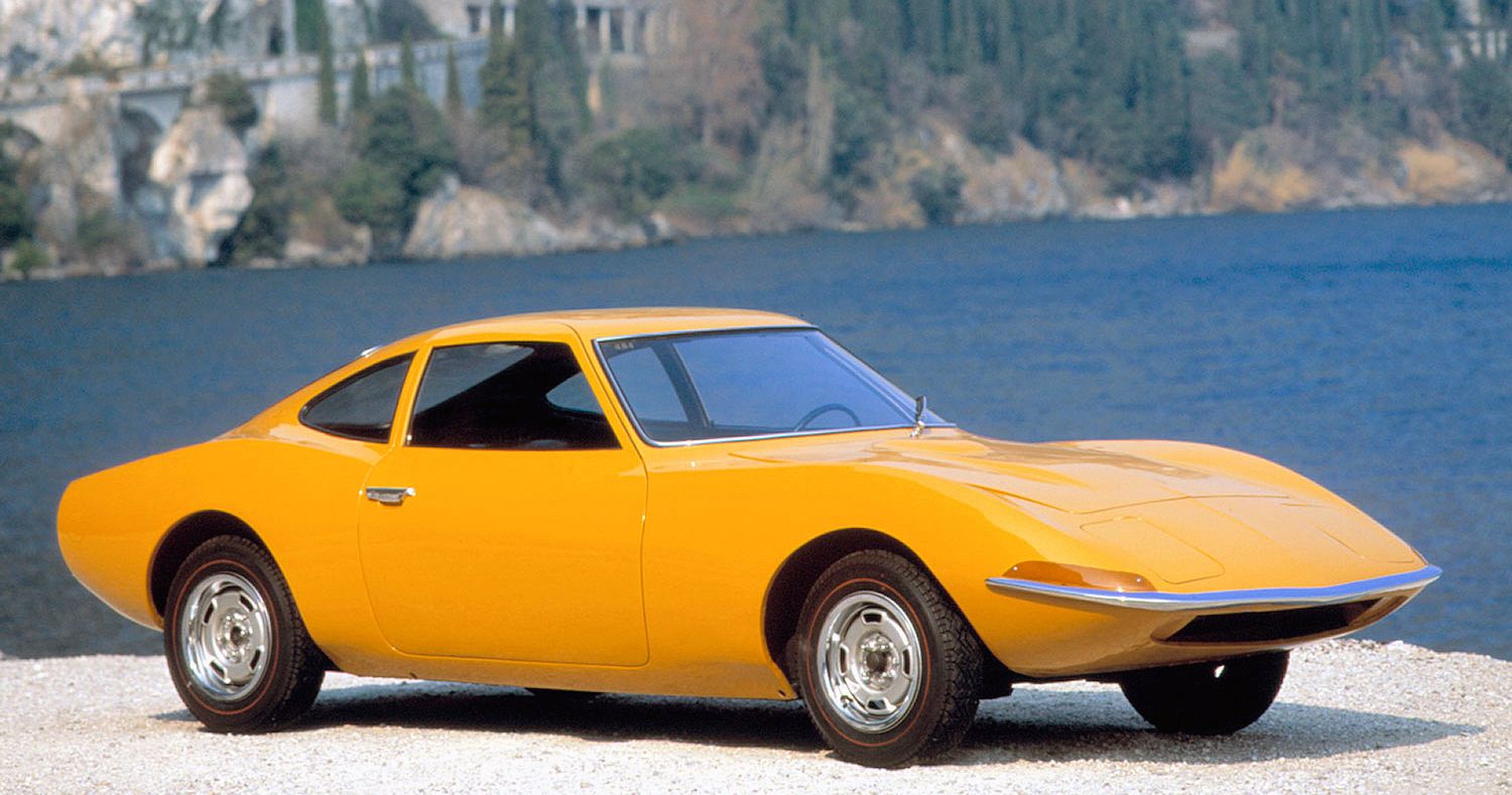 opel experimental gt parked next to lake