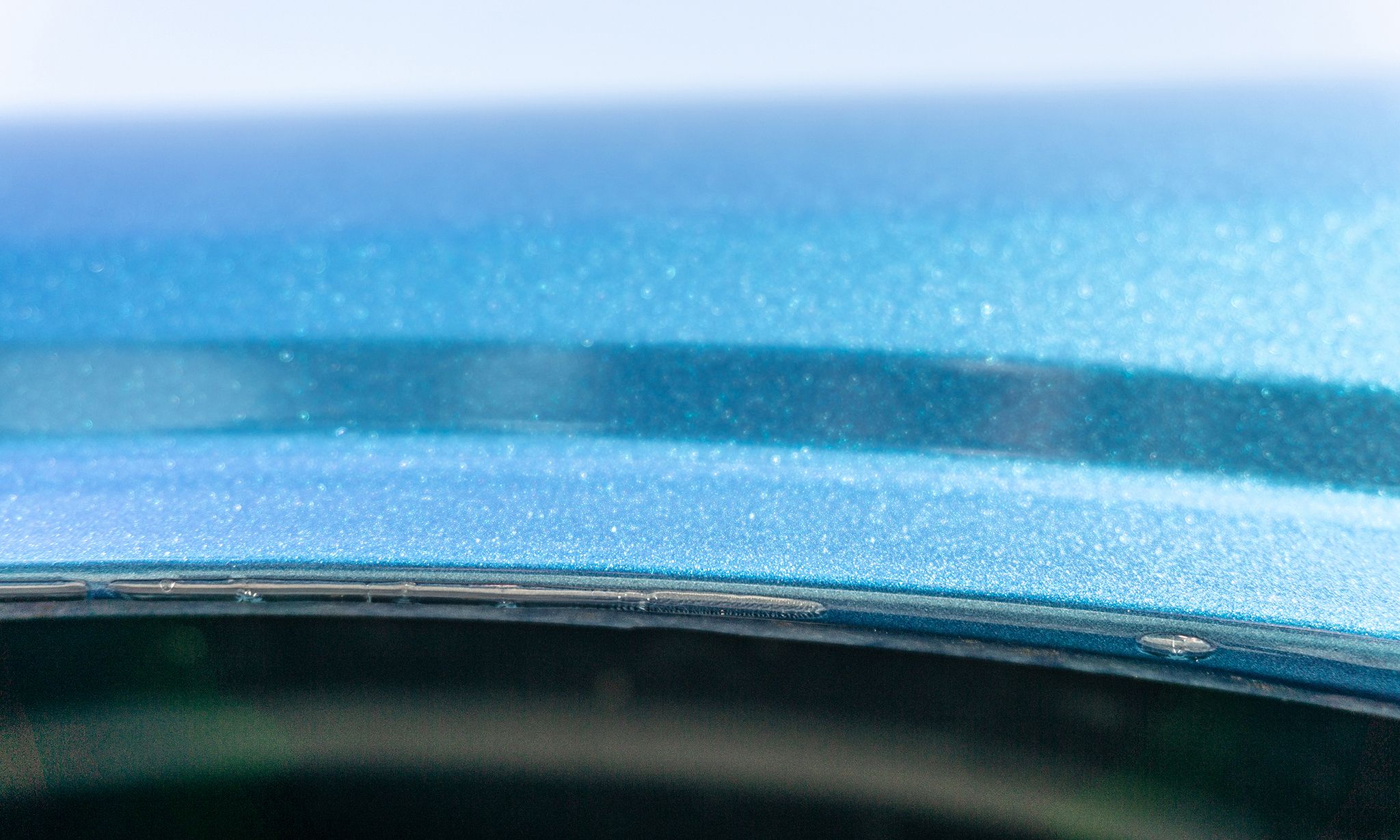 paint defects on a blue dodge challenger