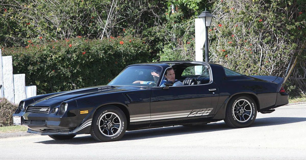 Matthew McConaughey driving his Camaro Z28