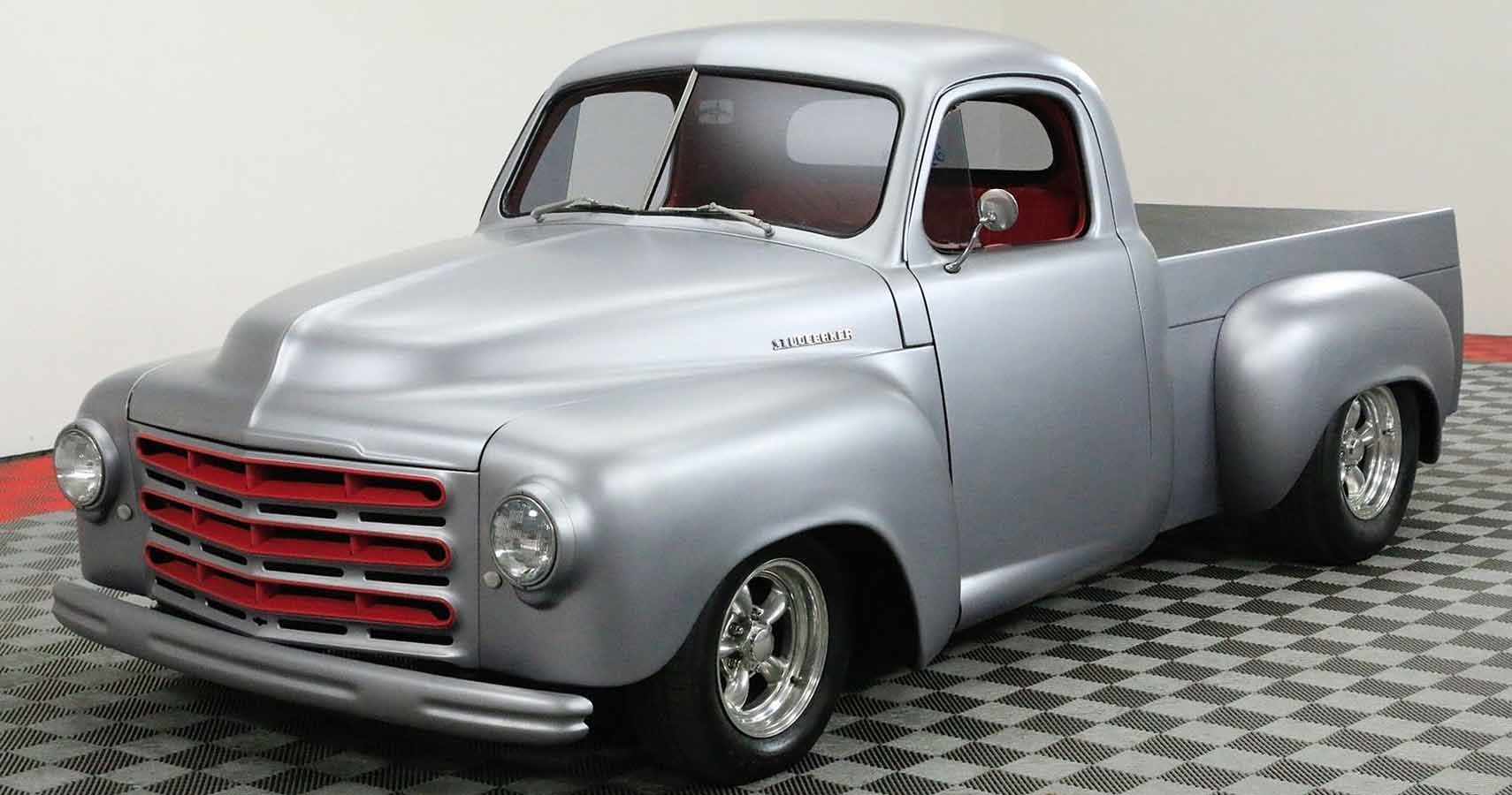 A Silver And Red 1952 Studebaker Pickup
