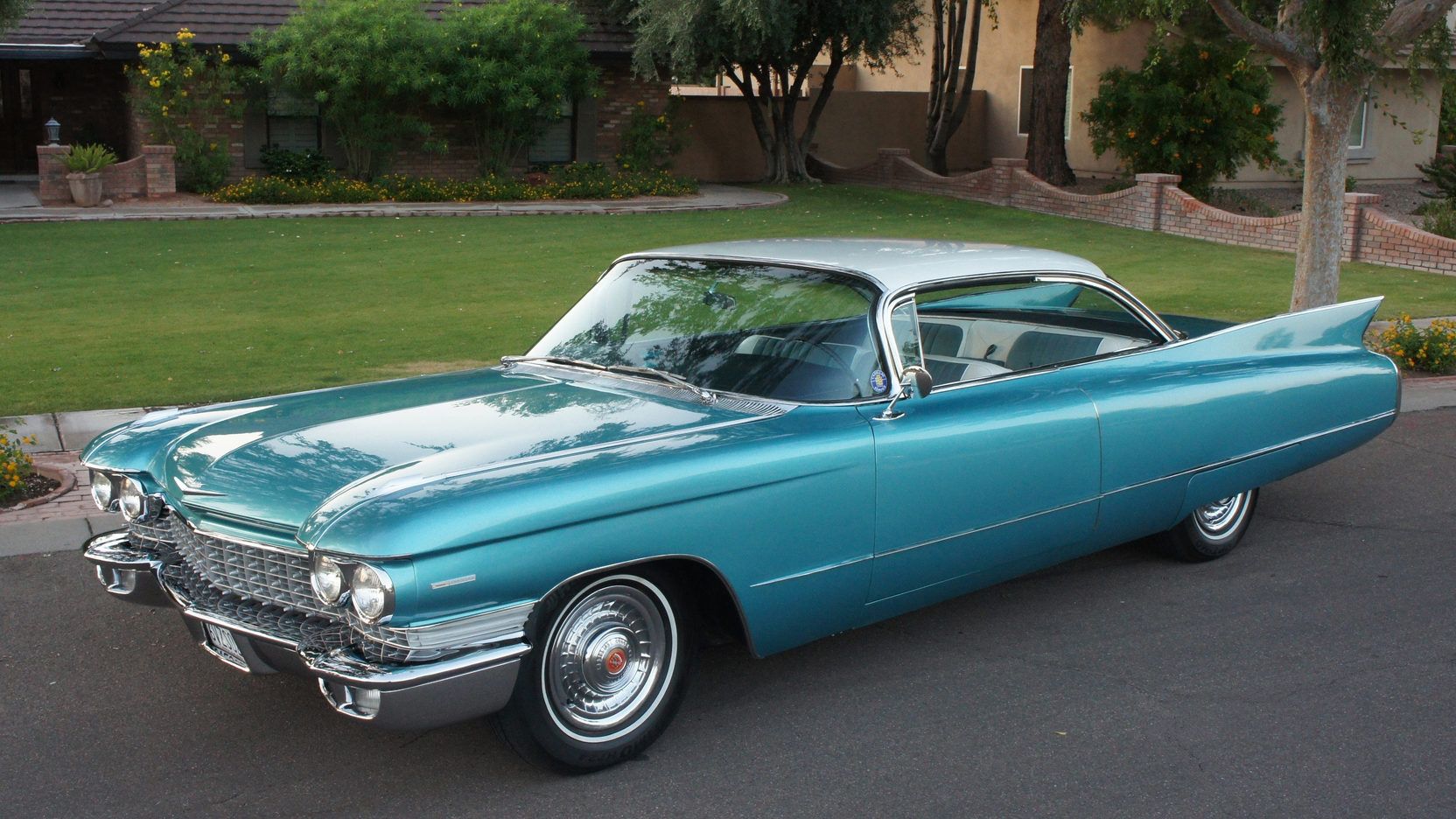 teal 1960 cadillac deville