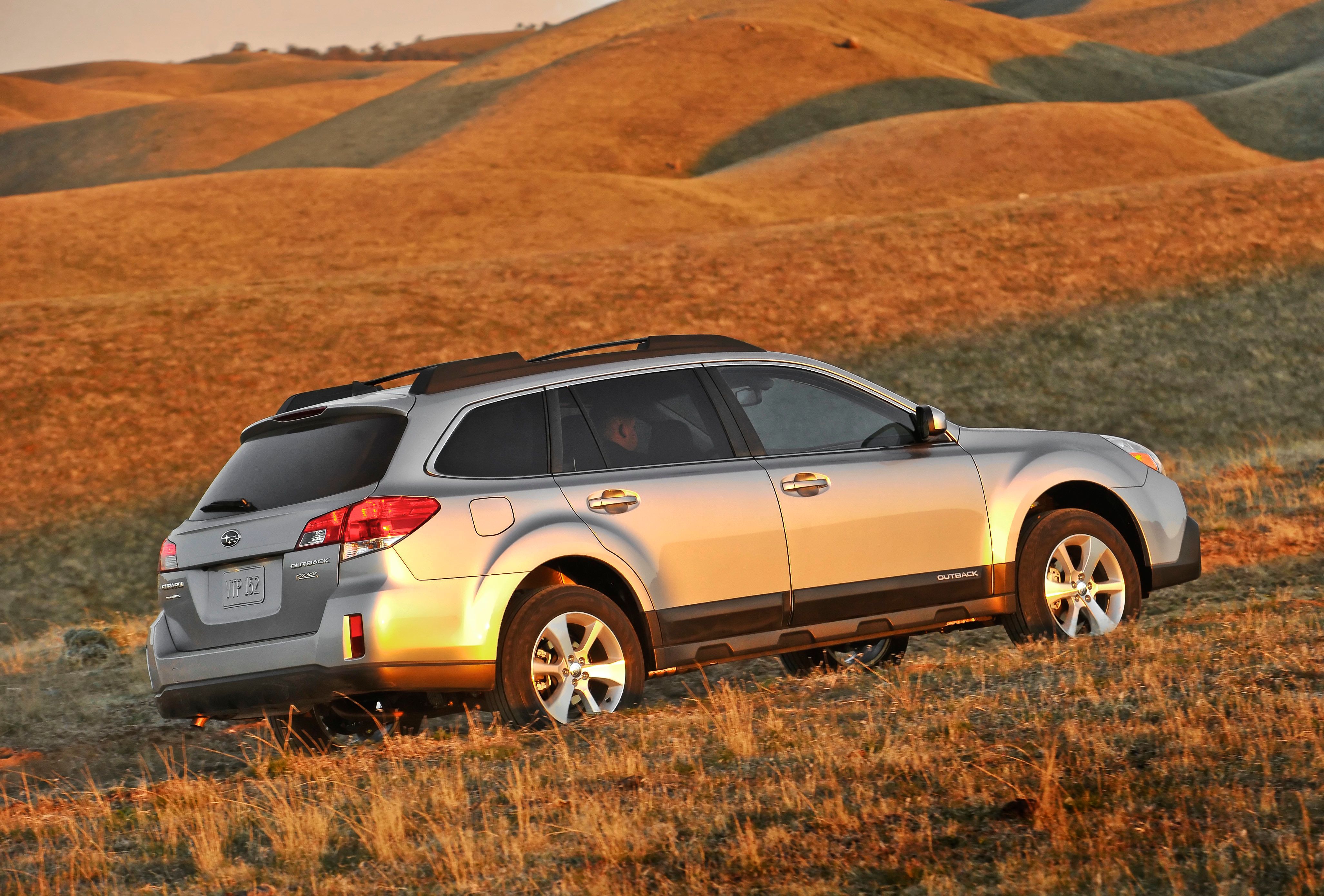 A 2013 Subaru Outback in the open plains