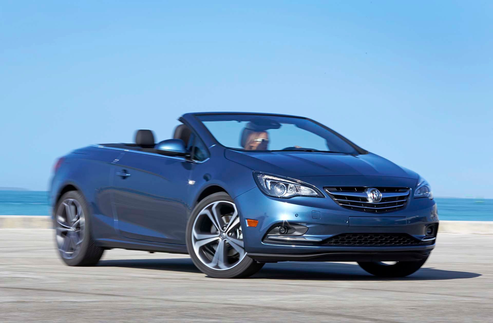 A 2019 Buick Cascada in motion in front of the ocean