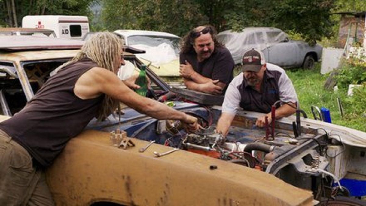 Rust Valley Restorers cast working on a classic car