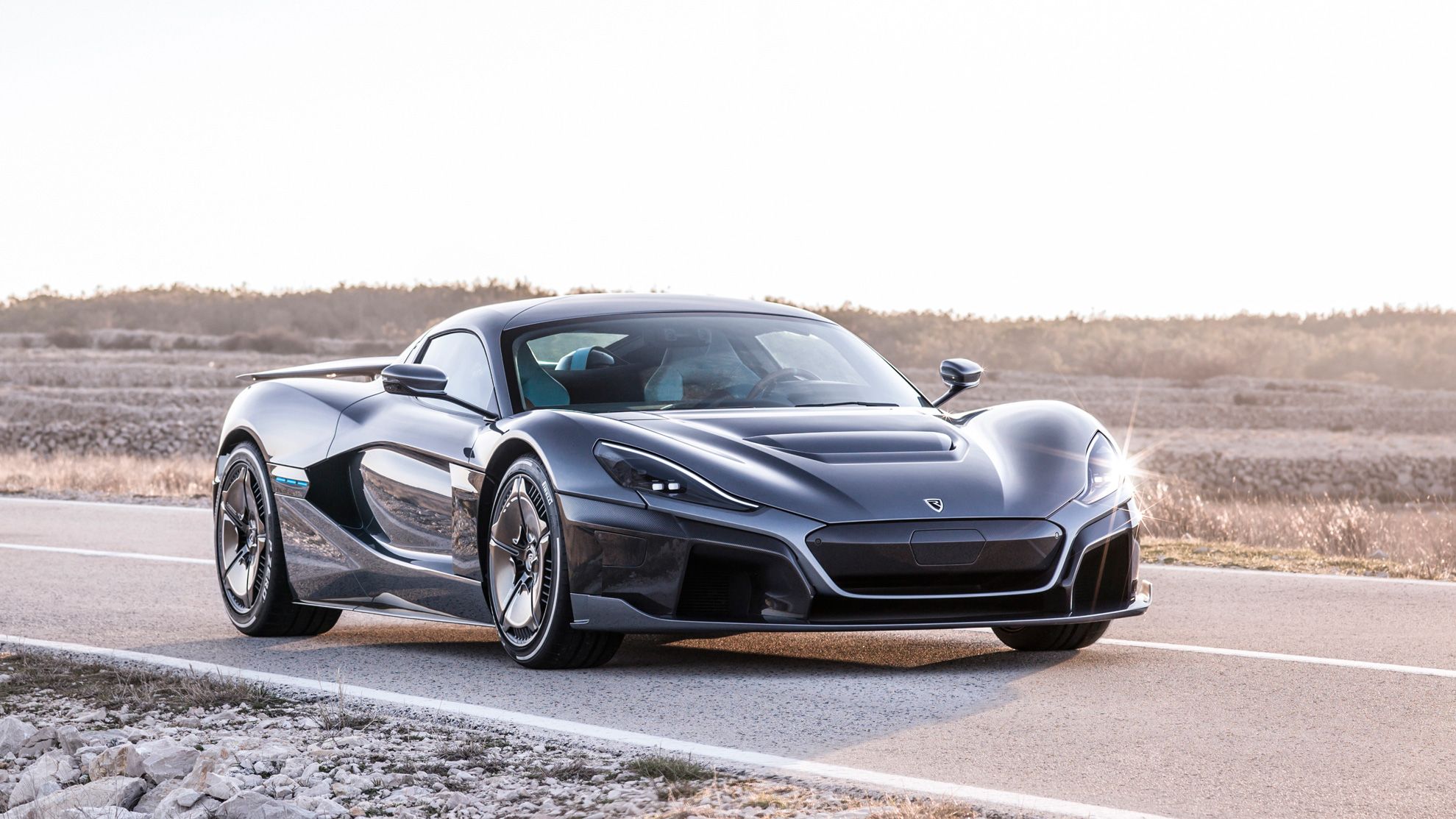 Rimac C-Two on roadside with desert background