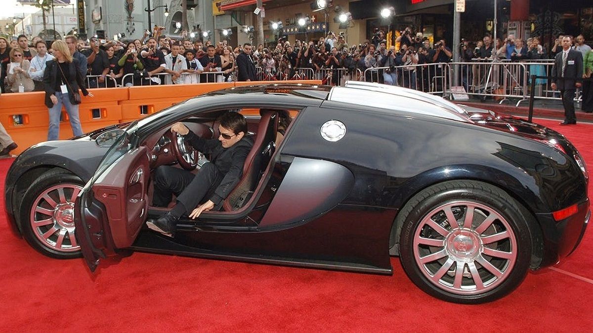 Tom Cruise Getting Out Of His Bugatti Veyron