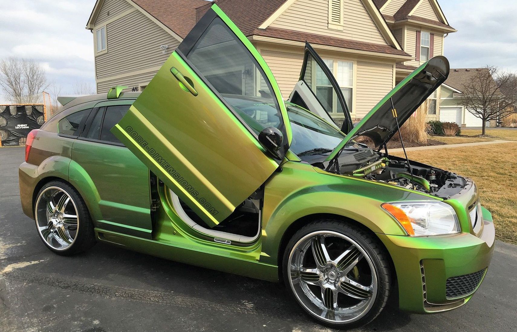 A Zany Green Dodge Caliber With Gullwings
