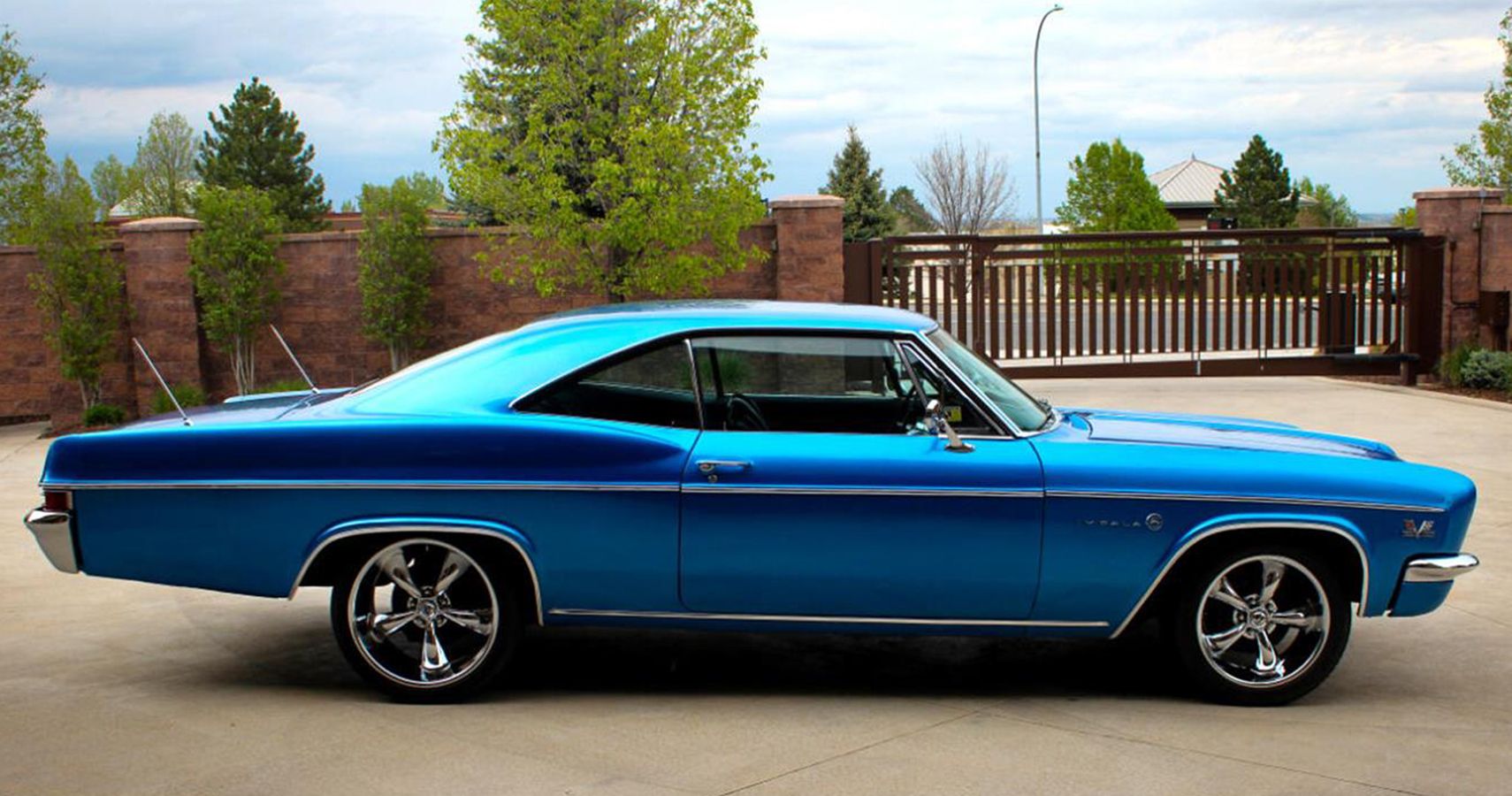 blue 1966 Chevrolet Impala profile