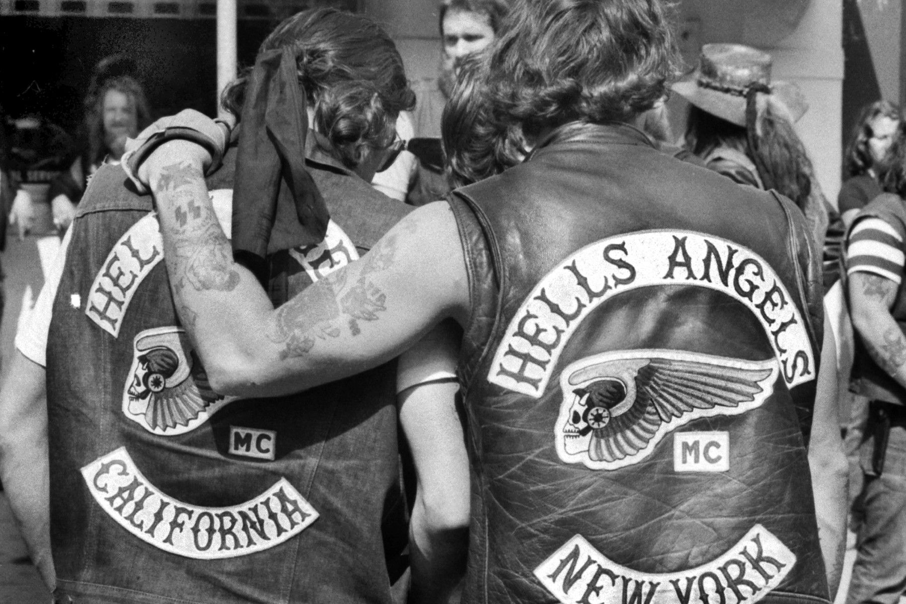 Hells Angels local member from New York consoles mourner from California for Vincent Girolamo outside of Provenzano Funeral Home