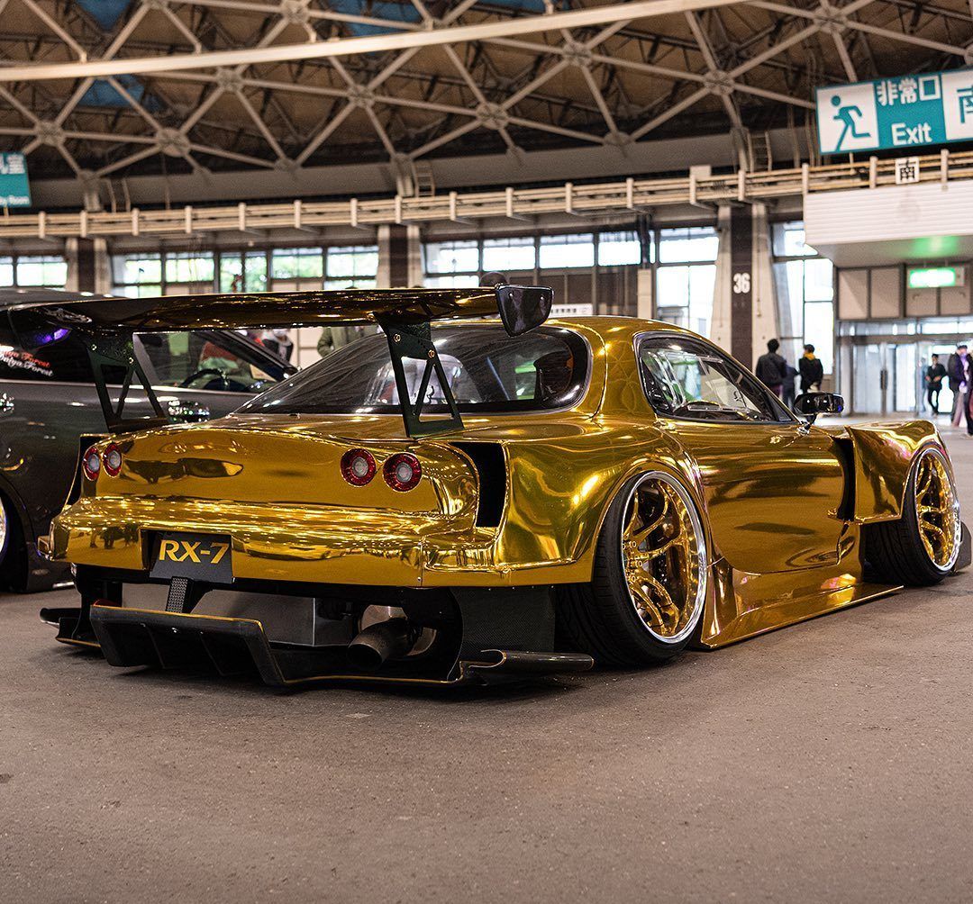 Mazda RX-7 In Gold With Wing