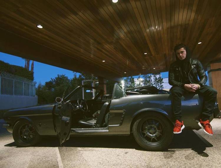 Zac Efron with 1965 Mustang
