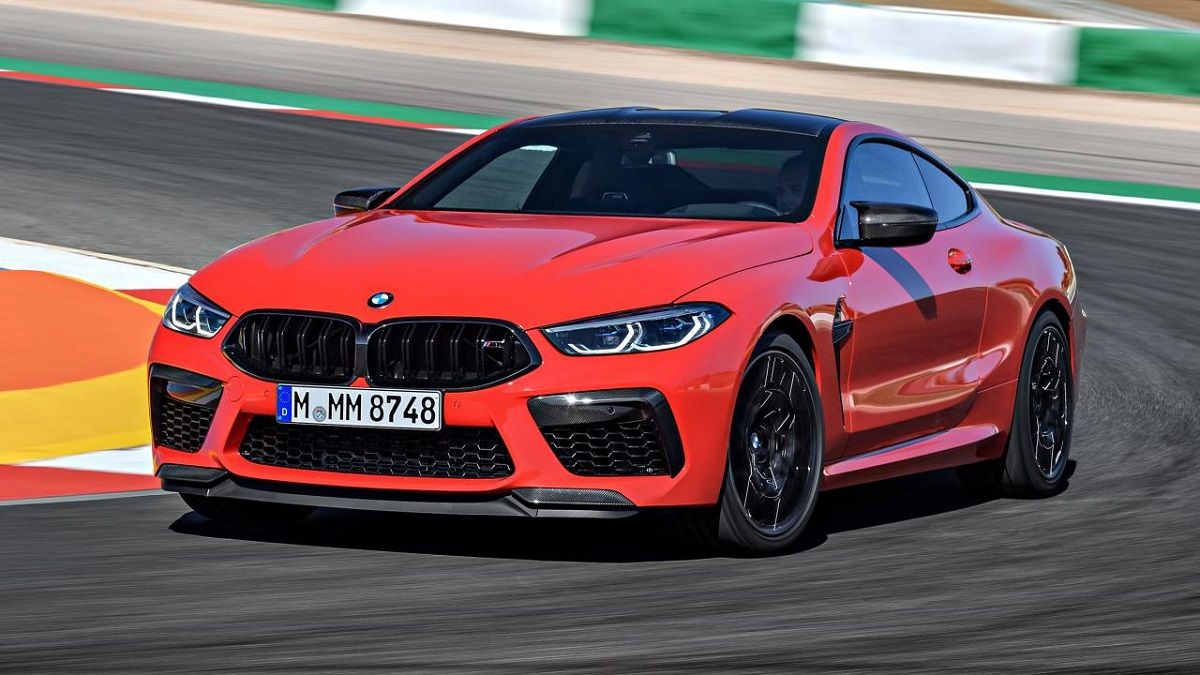 Red BMW M8 Competition Coupe On the Racing Track
