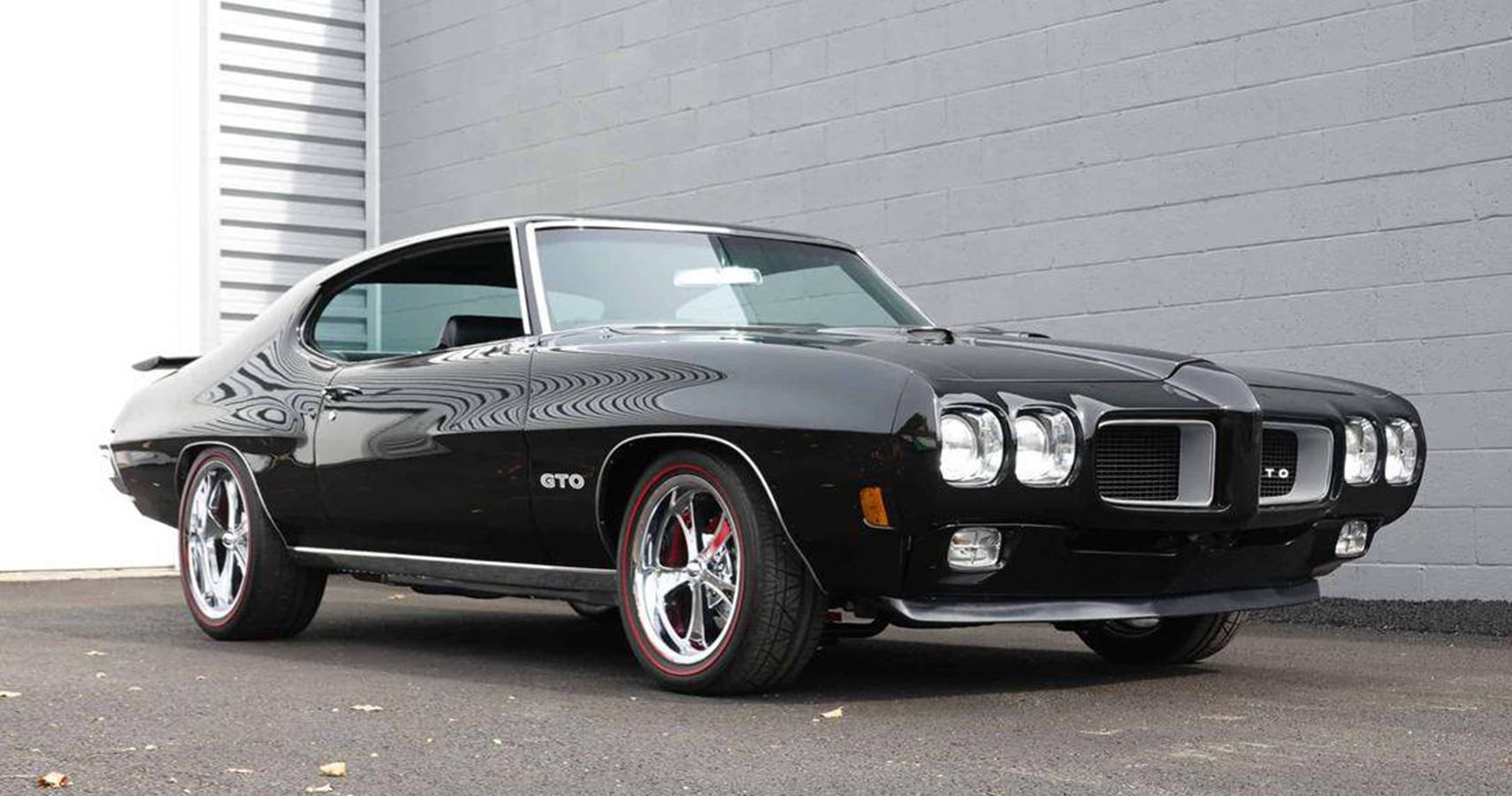 glossy black 1970 Pontiac GTO Hardtop Restomod quarter front