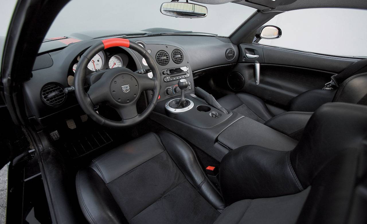 These Cool Sports Cars Have Garbage Interiors These Cool Sports Cars Have Garbage Interiors