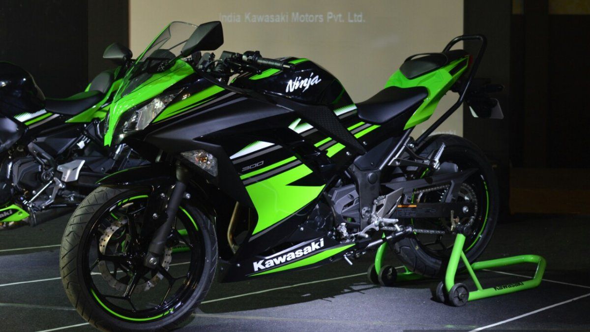 Green and black Kawasaki Ninja 300