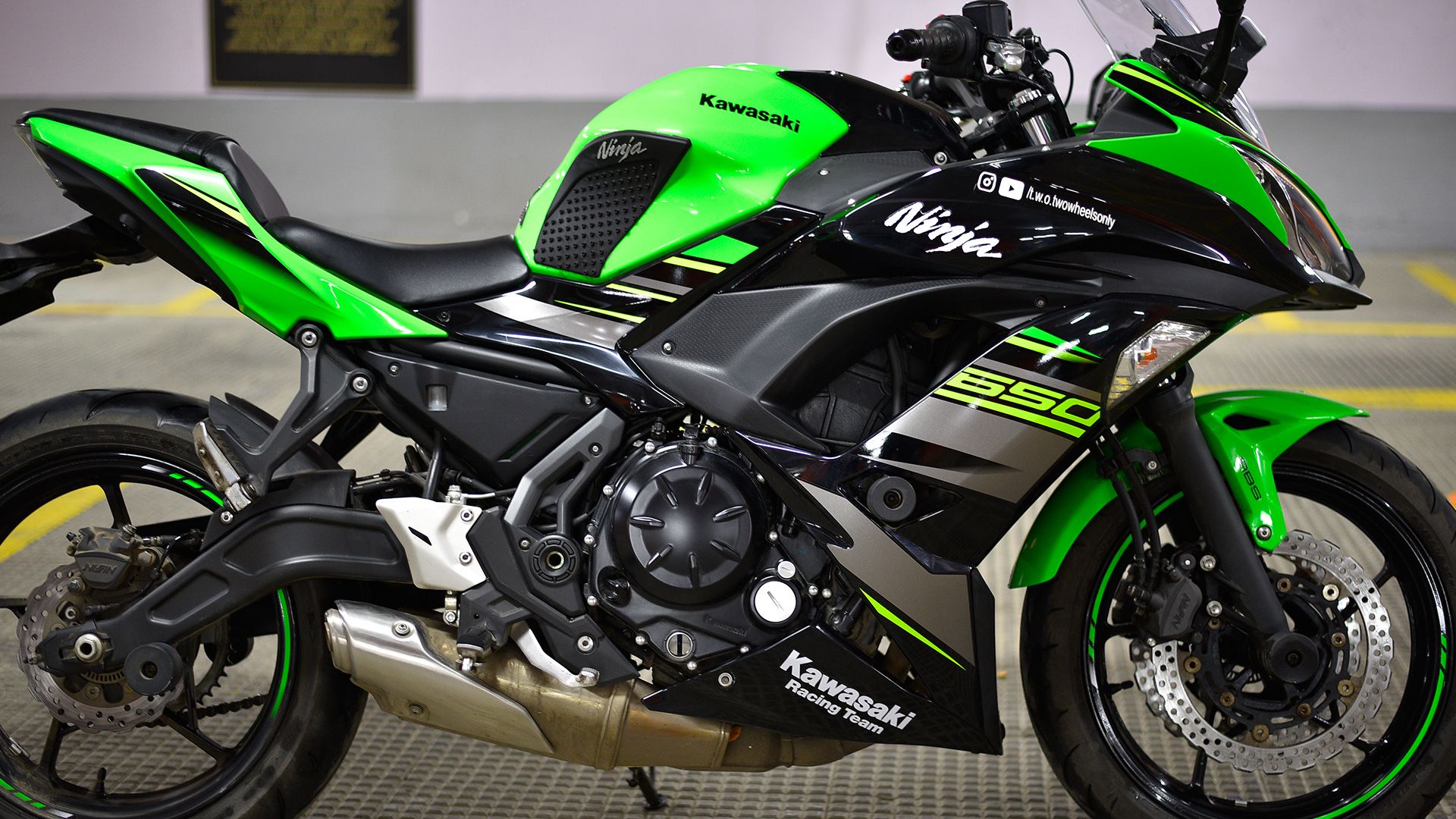 Green and black Kawasaki Ninja 650