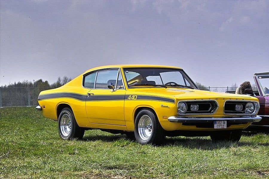 Bill Goldberg’s yellow 1970 Plymouth Barracuda parked on the grass