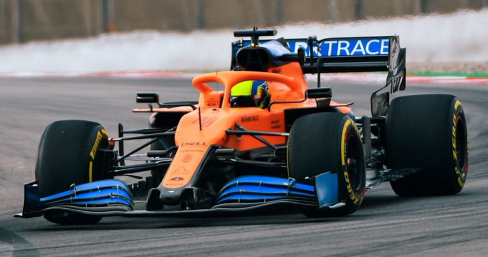 F1 racer Lando Norris on track in McLaren vehicle